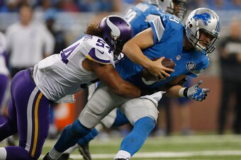 DETROIT, MI - OCTOBER 25: Matthew Stafford #9 of the Detroit Lions is sacked in the fourth quarter by Eric Kendricks #54 of the Minnesota Vikings at Ford Field on October 25, 2015 in Detroit, Michigan. Minnesota won the game 28-19. (Photo by Gregory Shamu
