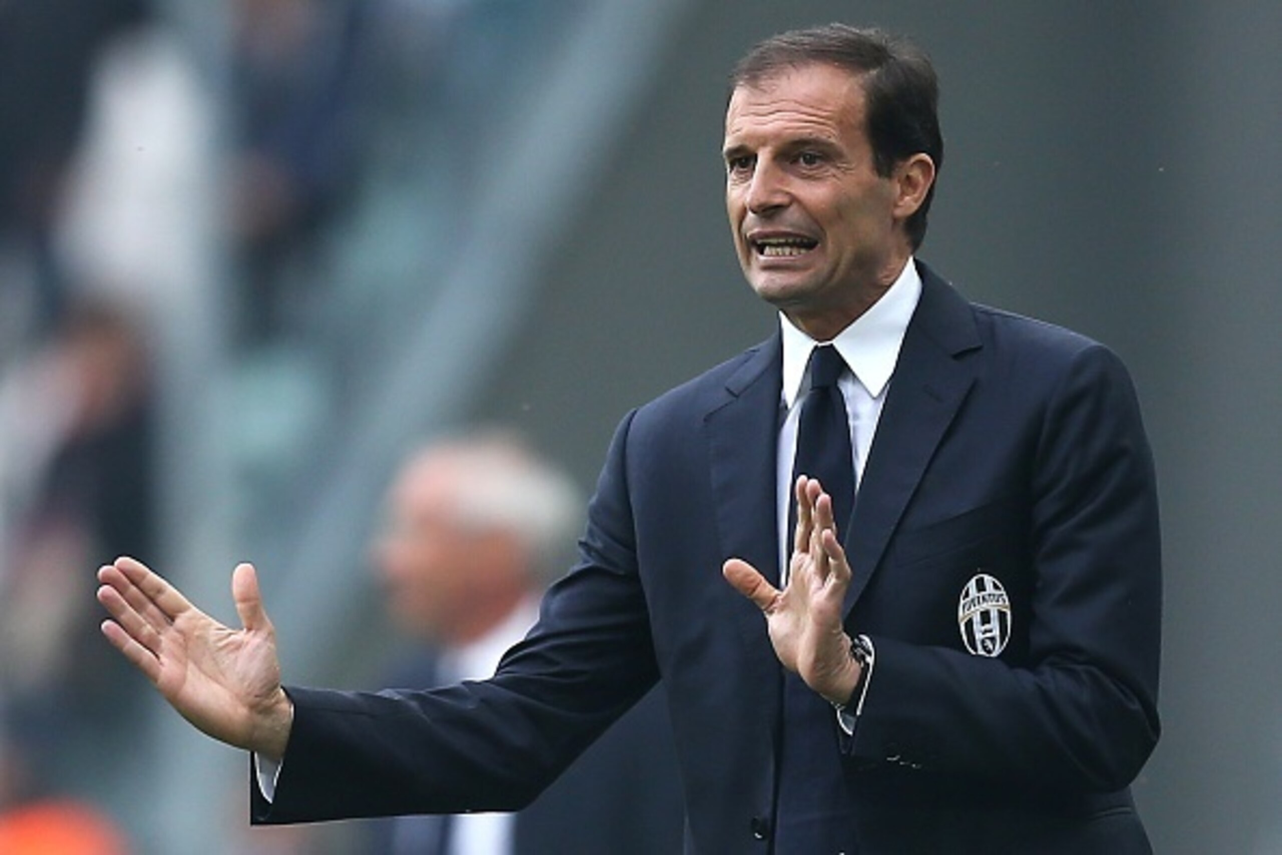 Juventus' coach Massimiliano Allegri gestures during the Italian Serie A football match Juventus vs Atalanta on October 25, 2015 at the 'Juventus Stadium' in Turin.  AFP PHOTO / MARCO BERTORELLO        (Photo credit should read MARCO BERTORELLO/AFP/Getty 