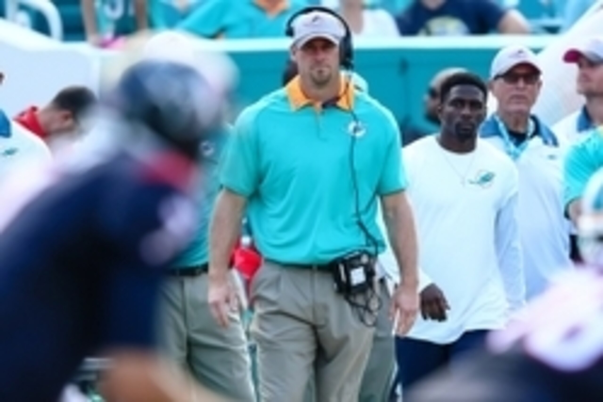 Oct 25, 2015; Miami Gardens, FL, USA; Miami Dolphins head coach Dan Campbell (C) looks on from the sideline during the second half against the Houston Texans at Sun Life Stadium. The Dolphins won 44-26. Mandatory Credit: Steve Mitchell-USA TODAY Sports