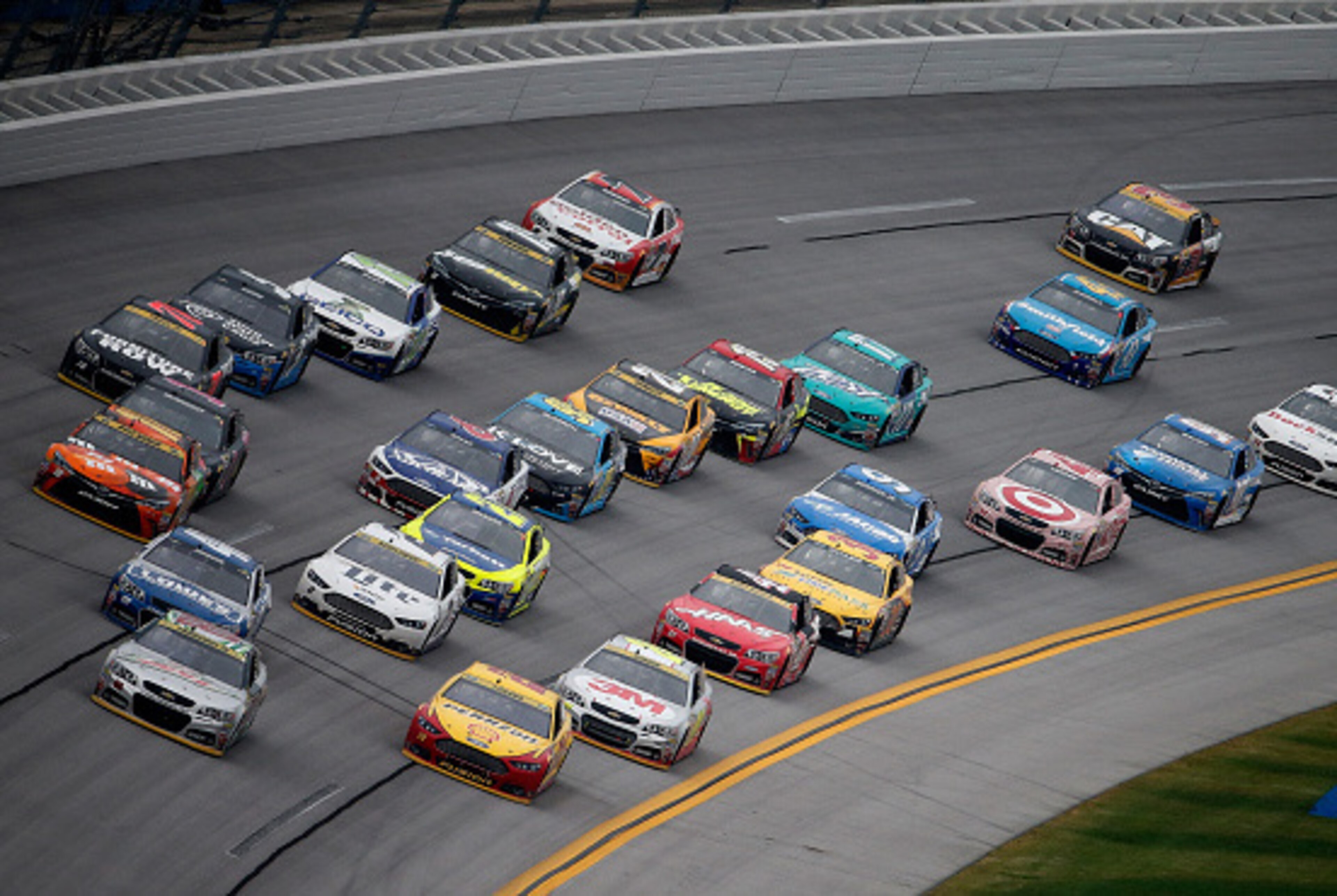 TALLADEGA, AL - OCTOBER 25: Dale Earnhardt Jr., driver of the #88 Diet Mountain Dew Chevrolet, leads the field during the NASCAR Sprint Cup Series CampingWorld.com 500 at Talladega Superspeedway on October 25, 2015 in Talladega, Alabama.  (Photo by Brian 
