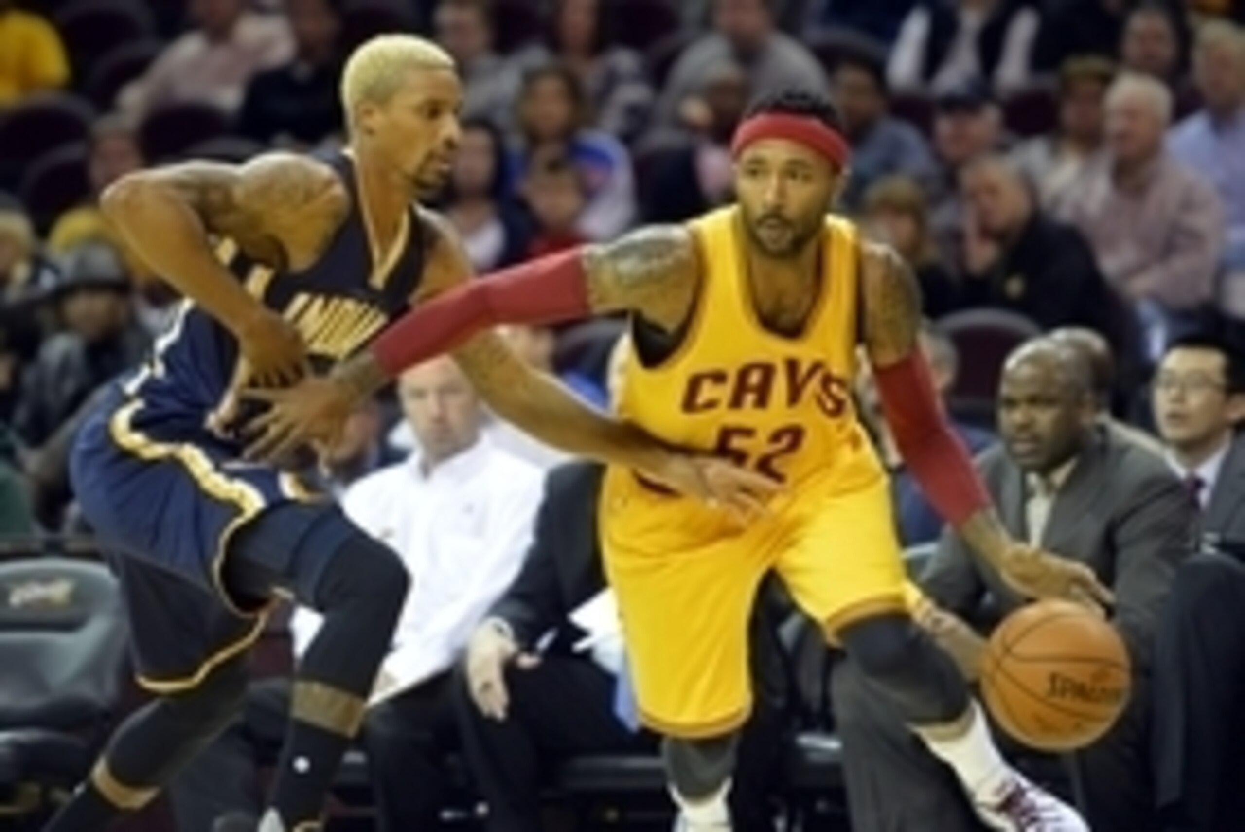 Oct 15, 2015; Cleveland, OH, USA; Cleveland Cavaliers guard Mo Williams (52) drives against Indiana Pacers guard George Hill (3) in the first quarter at Quicken Loans Arena. Mandatory Credit: David Richard-USA TODAY Sports