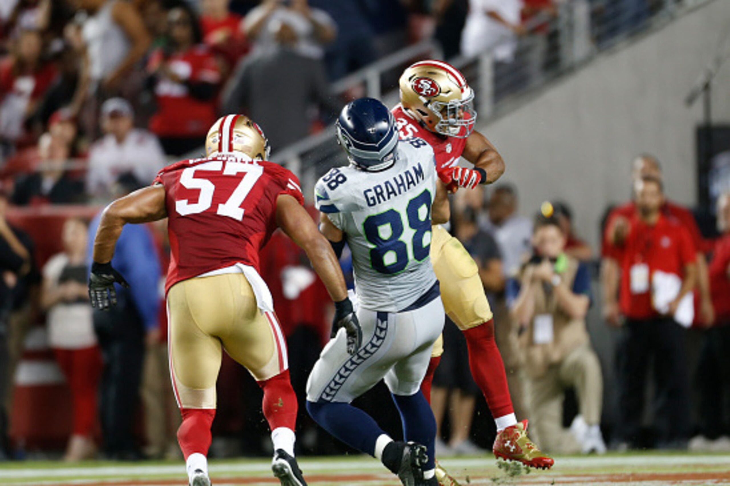 SANTA CLARA, CA - OCTOBER 22: Eric Reid #35 of the San Francisco 49ers lays a big hit on Jimmy Graham #88 of the Seattle Seahawks, to break up a pass, during the game at Levi Stadium on October 22, 2015 in Santa Clara, California. The Seahawks defeated th