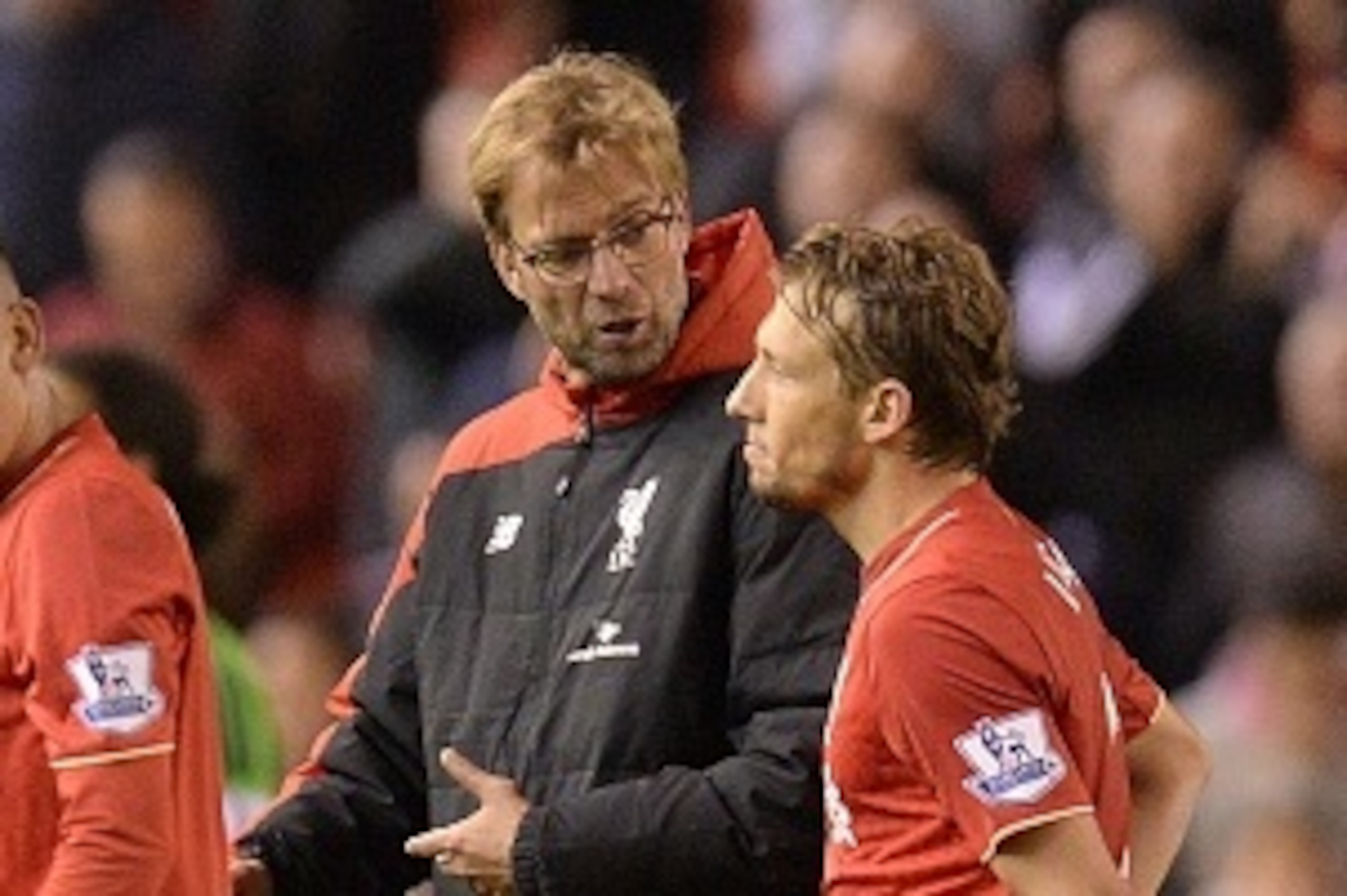 Liverpool's German manager Jurgen Klopp (2nd R) speaks to Liverpool's Brazilian midfielder Lucas Leiva (R) as he leaves the pitch after the English Premier League football match between Liverpool and Southampton at Anfield stadium in Liverpool, north west Liverpool's German manager Jurgen Klopp (2nd R) speaks to Liverpool's Brazilian midfielder Lucas Leiva (R) as he leaves the pitch after the English Premier League football match between Liverpool and Southampton at Anfield stadium in Liverpool, north west