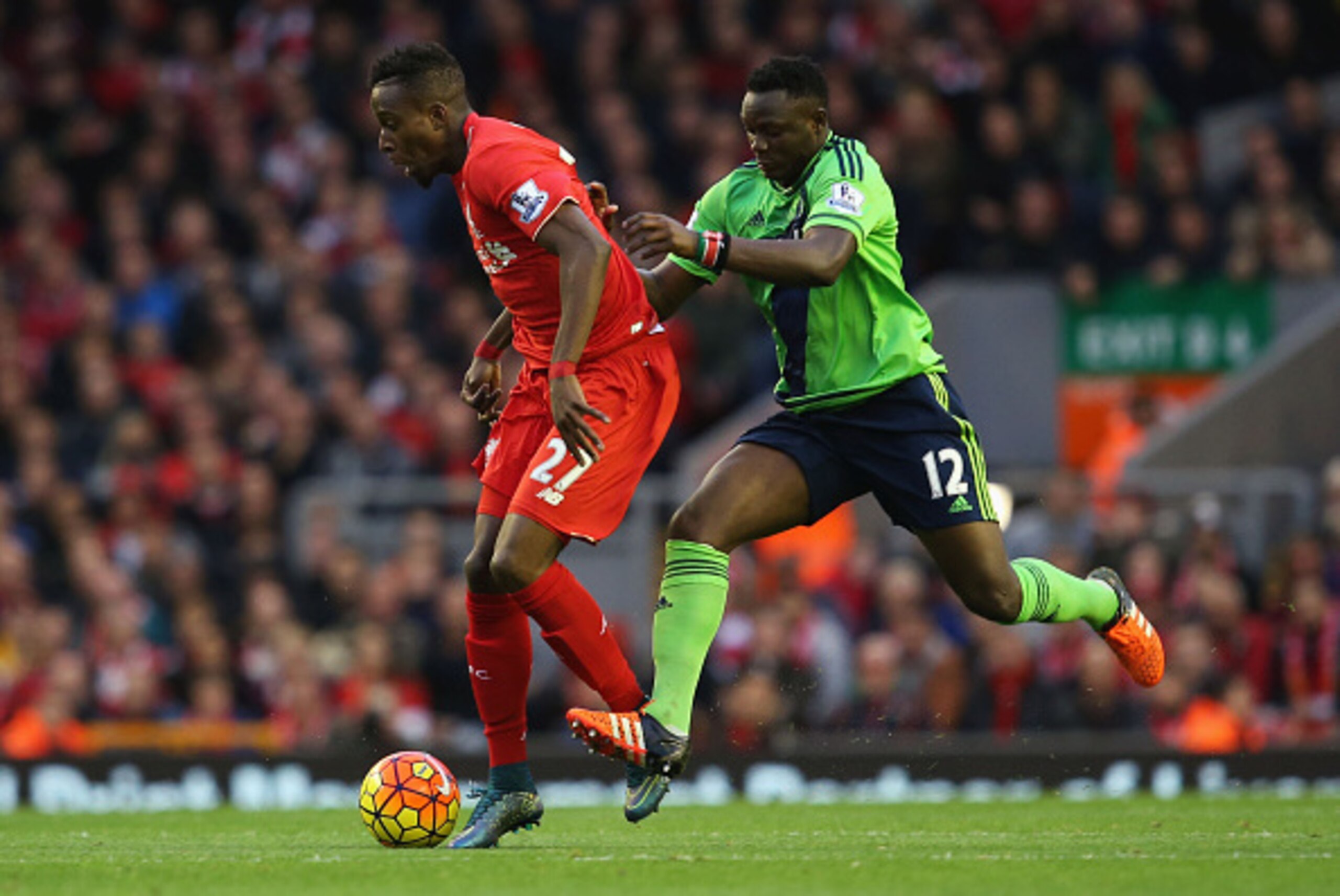 LIVERPOOL, ENGLAND - OCTOBER 25: Divock Origi of Liverpool is challenged by Victor Wanyama of Southampton during the Barclays Premier League match between Liverpool and Southampton at Anfield on October 25, 2015 in Liverpool, England. (Photo by Jan Kruge LIVERPOOL, ENGLAND - OCTOBER 25: Divock Origi of Liverpool is challenged by Victor Wanyama of Southampton during the Barclays Premier League match between Liverpool and Southampton at Anfield on October 25, 2015 in Liverpool, England. (Photo by Jan Kruge