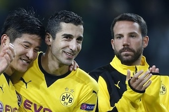 (L-R) Dortmund's midfielder Julian Weigl, Dortmund's Korean defender Joo-Ho Park, Dortmund's Armenian midfielder Henrikh Mkhitaryan and Dortmund's midfielder Gonzalo Castro celebrate after the UEFA Europa League Group C football match between Borussia Dor