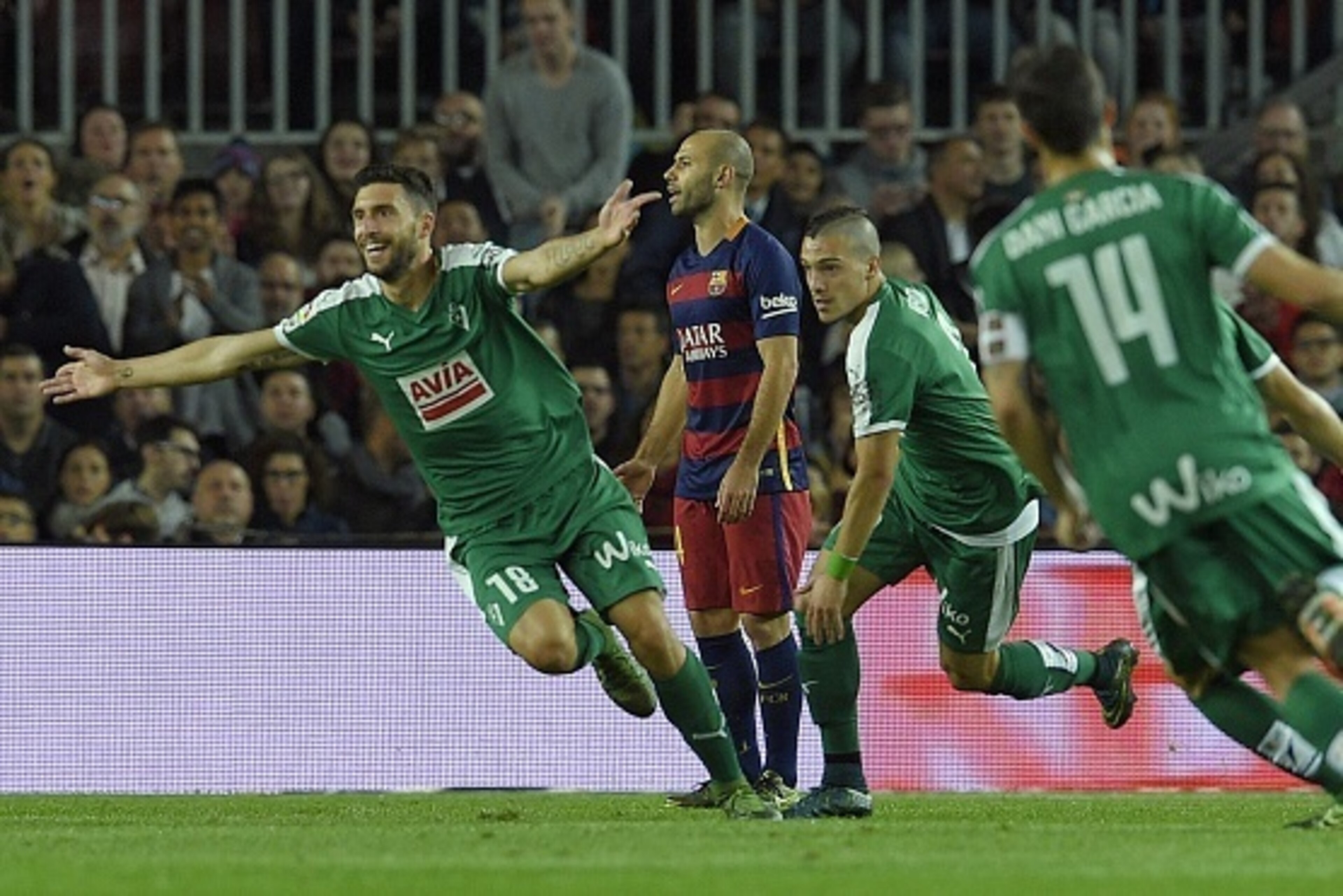 Eibar's forward Borja Gonzalez (L) celebrates next to Barcelona's Argentinian defender Javier Mascherano (C) after scoring a goal during the Spanish league football match FC Barcelona vs SD Eibar at the Camp Nou stadium in Barcelona on October 25, 2015. Eibar's forward Borja Gonzalez (L) celebrates next to Barcelona's Argentinian defender Javier Mascherano (C) after scoring a goal during the Spanish league football match FC Barcelona vs SD Eibar at the Camp Nou stadium in Barcelona on October 25, 2015.
