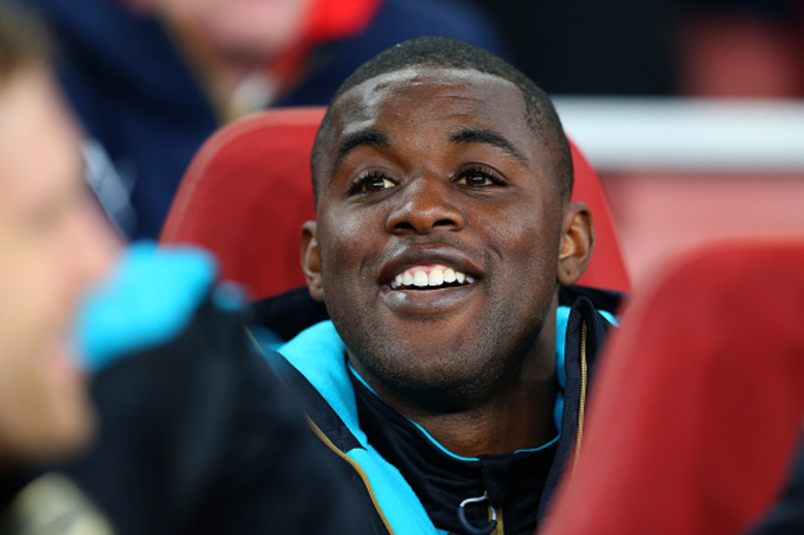 LONDON, ENGLAND - SEPTEMBER 29:  Joel Campbell of Arsenal on the bench before the UEFA Champions League match between Arsenal and Olympiacos at the Emirates Stadium on September 29, 2015 in London, United Kingdom.  (Photo by Catherine Ivill - AMA/Getty Im