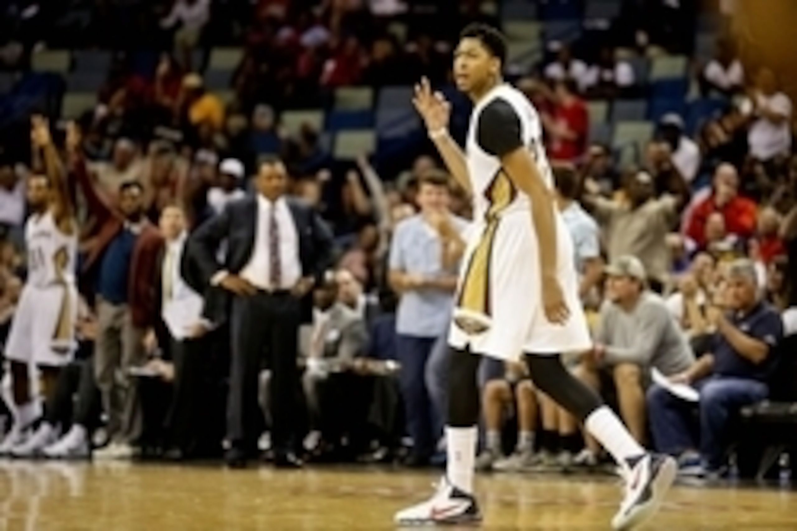 Oct 23, 2015; New Orleans, LA, USA; New Orleans Pelicans forward Anthony Davis (23) reacts after scoring a three pointer against the Miami Heat during the fourth quarter of a game at the Smoothie King Center. The Pelicans won 93-90. Mandatory Credit: Deri