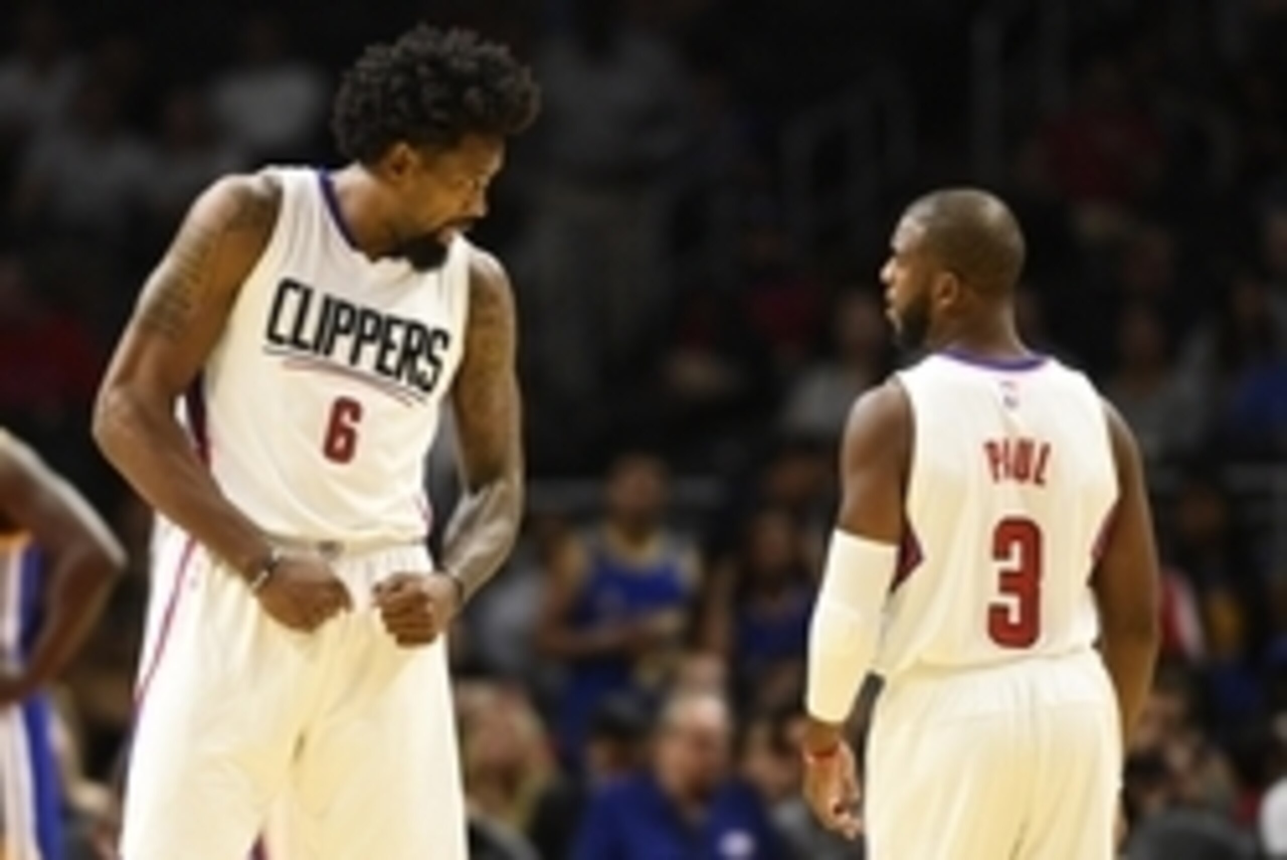 Oct 20, 2015; Los Angeles, CA, USA; Los Angeles Clippers center DeAndre Jordan (left) talks with Los Angeles Clippers guard Chris Paul (right) during the first quarter against the Golden State Warriors at Staples Center. Mandatory Credit: Kelvin Kuo-USA T