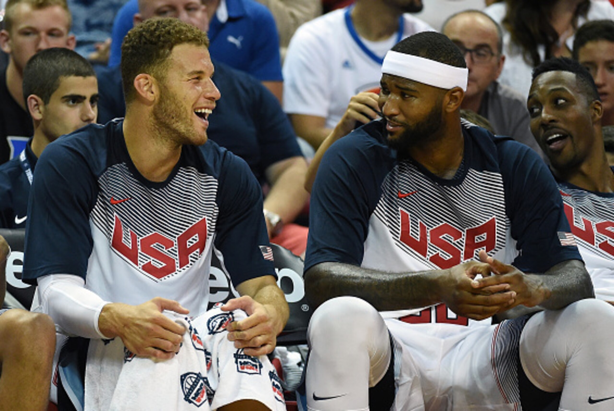 LAS VEGAS, NV - AUGUST 13:  (L-R) Blake Griffin #44, DeMarcus Cousins #36 and Dwight Howard of the 2015 USA Basketball Men's National Team laugh on the bench during a USA Basketball showcase at the Thomas & Mack Center on August 13, 2015 in Las Vegas, Nev