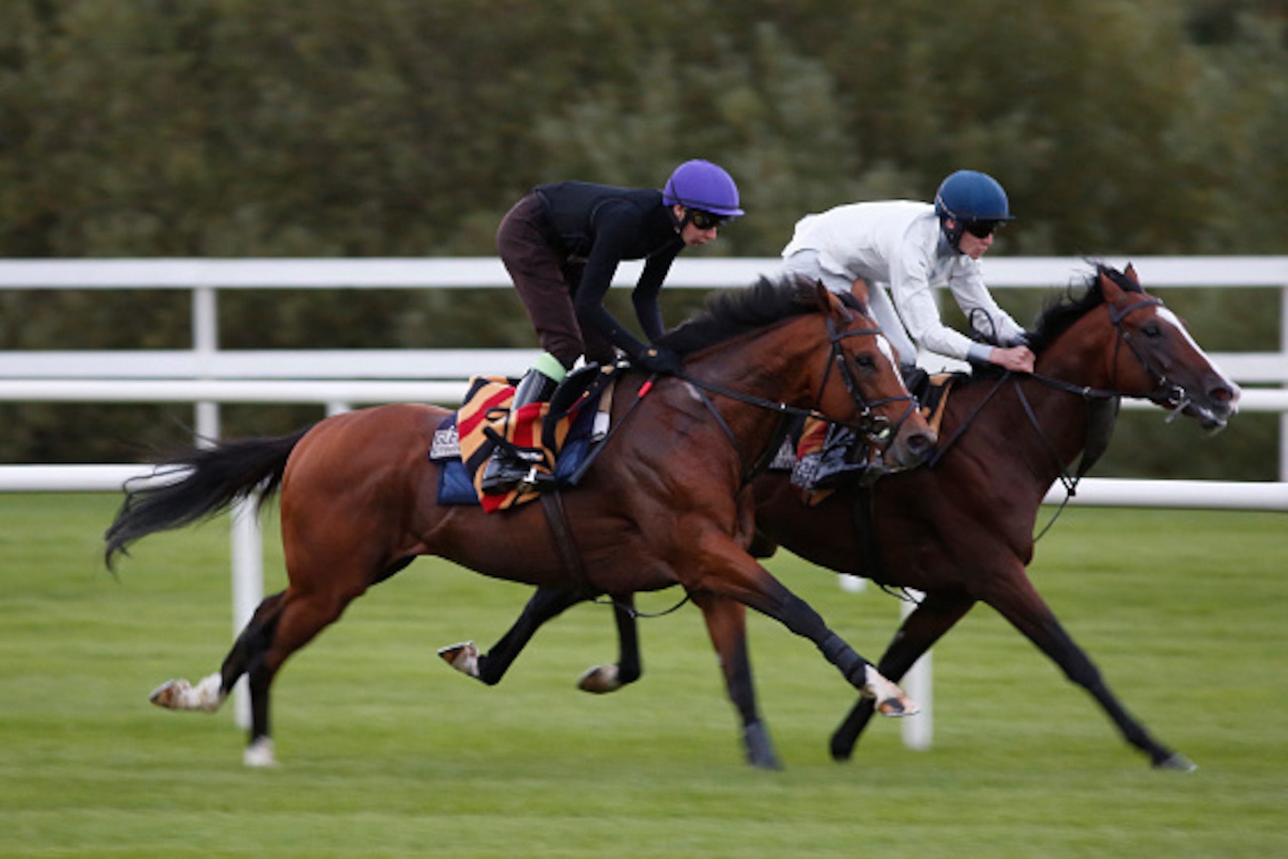 DUBLIN, IRELAND - SEPTEMBER 12: Joseph O'Brien riding Gleneagles (L) gallop after racing at Leopardstown racecourse on September 12, 2015 in Dublin, Ireland. (Photo by Alan Crowhurst/Getty Images)