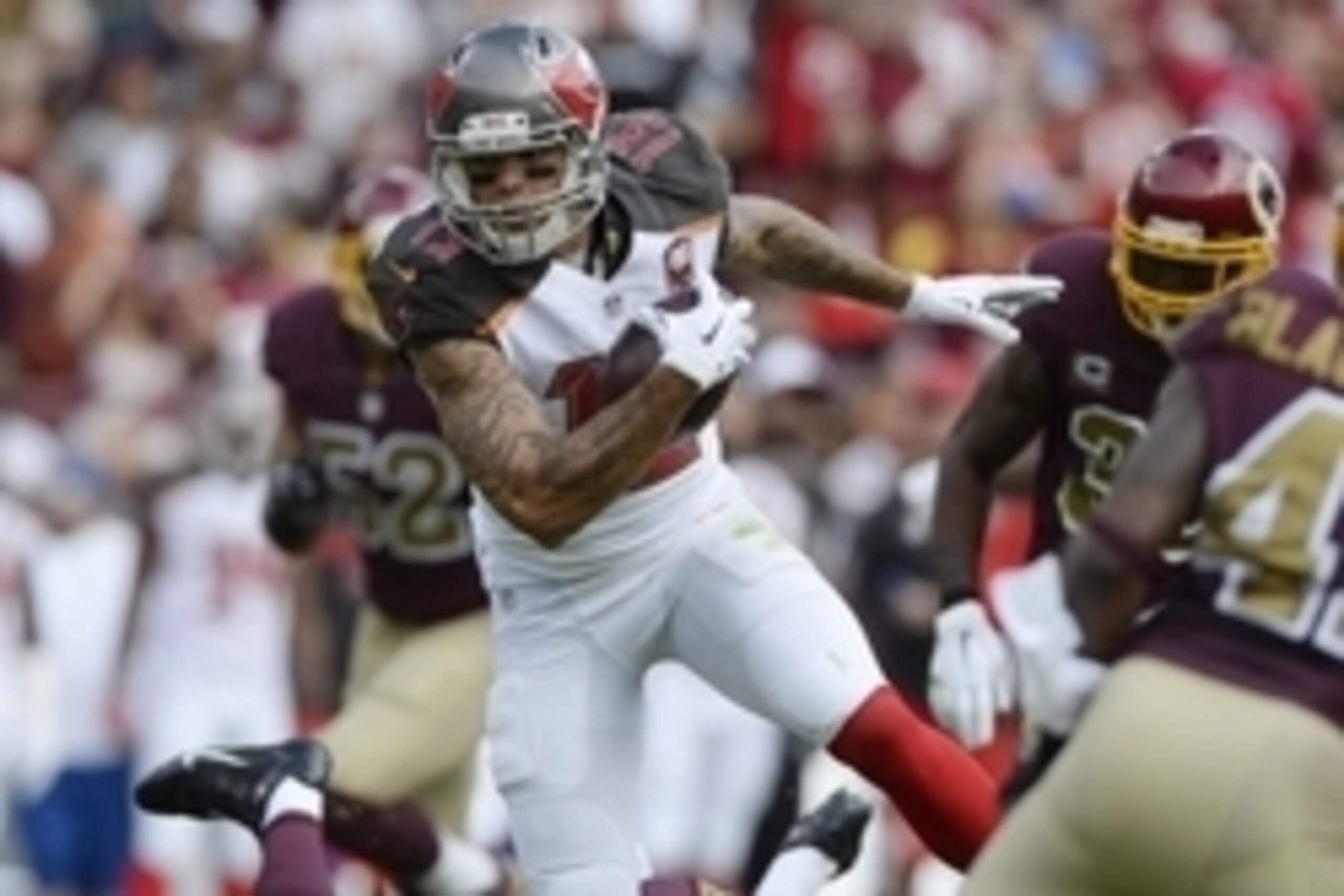 Oct 25, 2015; Landover, MD, USA; Tampa Bay Buccaneers wide receiver Mike Evans (13) runs after the catch during the first quarter against the Washington Redskins  at FedEx Field. Mandatory Credit: Tommy Gilligan-USA TODAY Sports