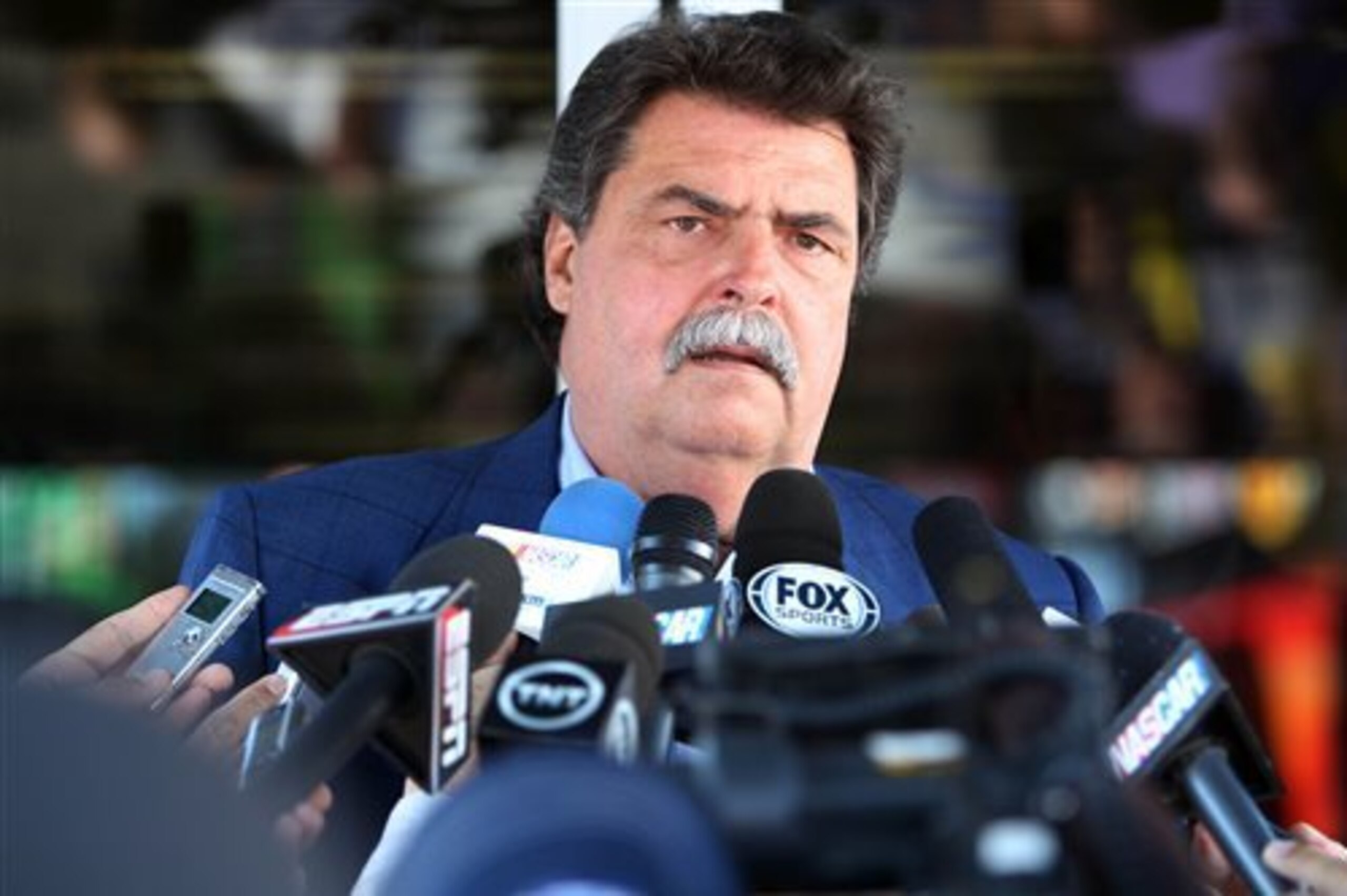 Mike Helton faced some tough questions about the 'Dega finish.