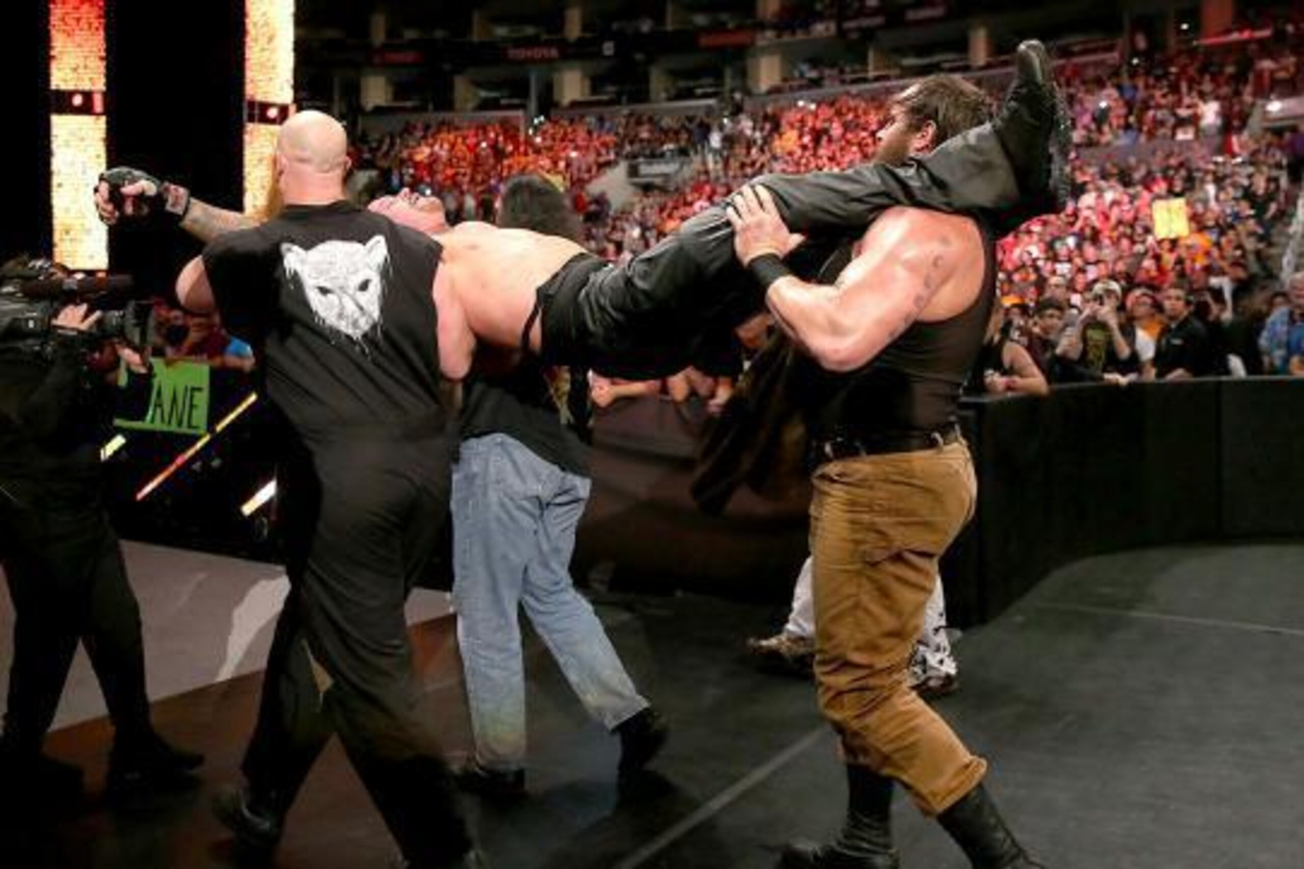 The Wyatt Family carry off Undertaker.