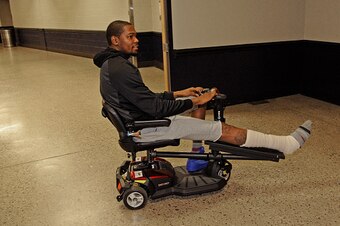 OKLAHOMA CITY, OK- APRIL 5:  Kevin Durant #35 of the Oklahoma City Thunder arrives before the game against the Houston Rockets on April 5, 2015 at Chesapeake Energy Arena in Oklahoma City, Oklahoma. NOTE TO USER: User expressly acknowledges and agrees tha