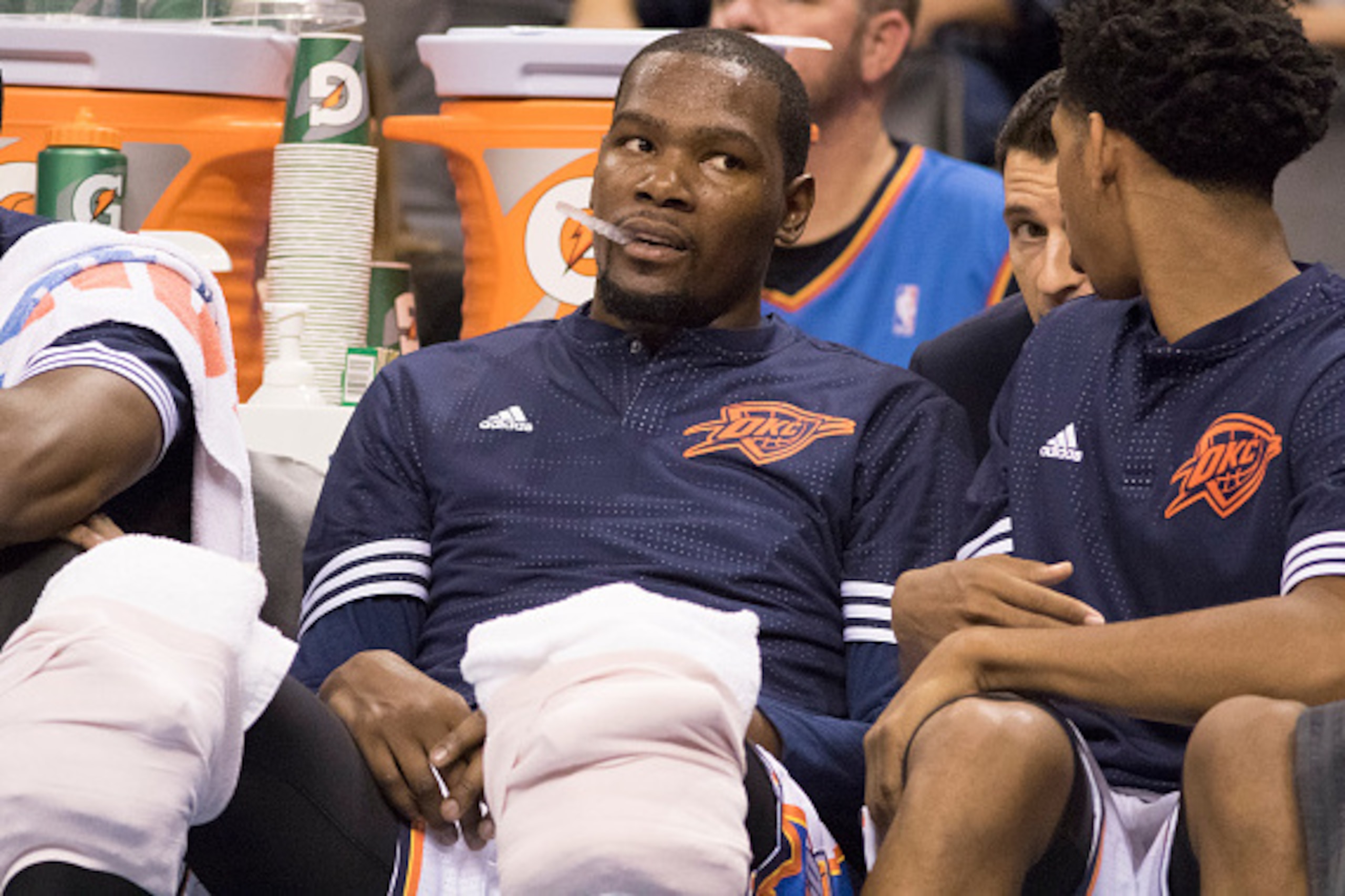 OKLAHOMA CITY, OK - OCTOBER 9: Kevin Durant #35 of the Oklahoma City Thunder sits on the bench during the second quarter of a NBA preseason game against Fenerbahce Ulcer  at the Chesapeake Energy Arena on October 9, 2015 in Oklahoma City, Oklahoma. NOTE T