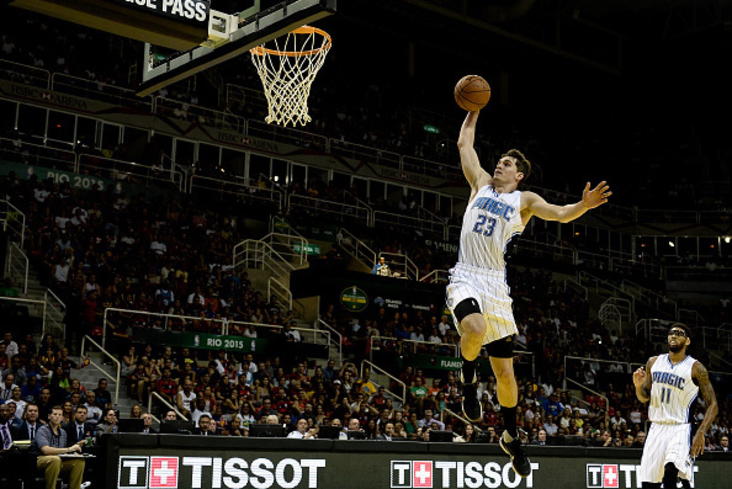 RIO DE JANEIRO, BRAZIL - OCTOBER 17:  Mario Hezonja #23 of the Orlando Magic dunks the ball against C.R. Flamengo during a NBA Global Games Rio 2015 match at HSBC Arena on October 17, 2015 in Rio de Janeiro, Brazil.  (Photo by Buda Mendes/Getty Images)