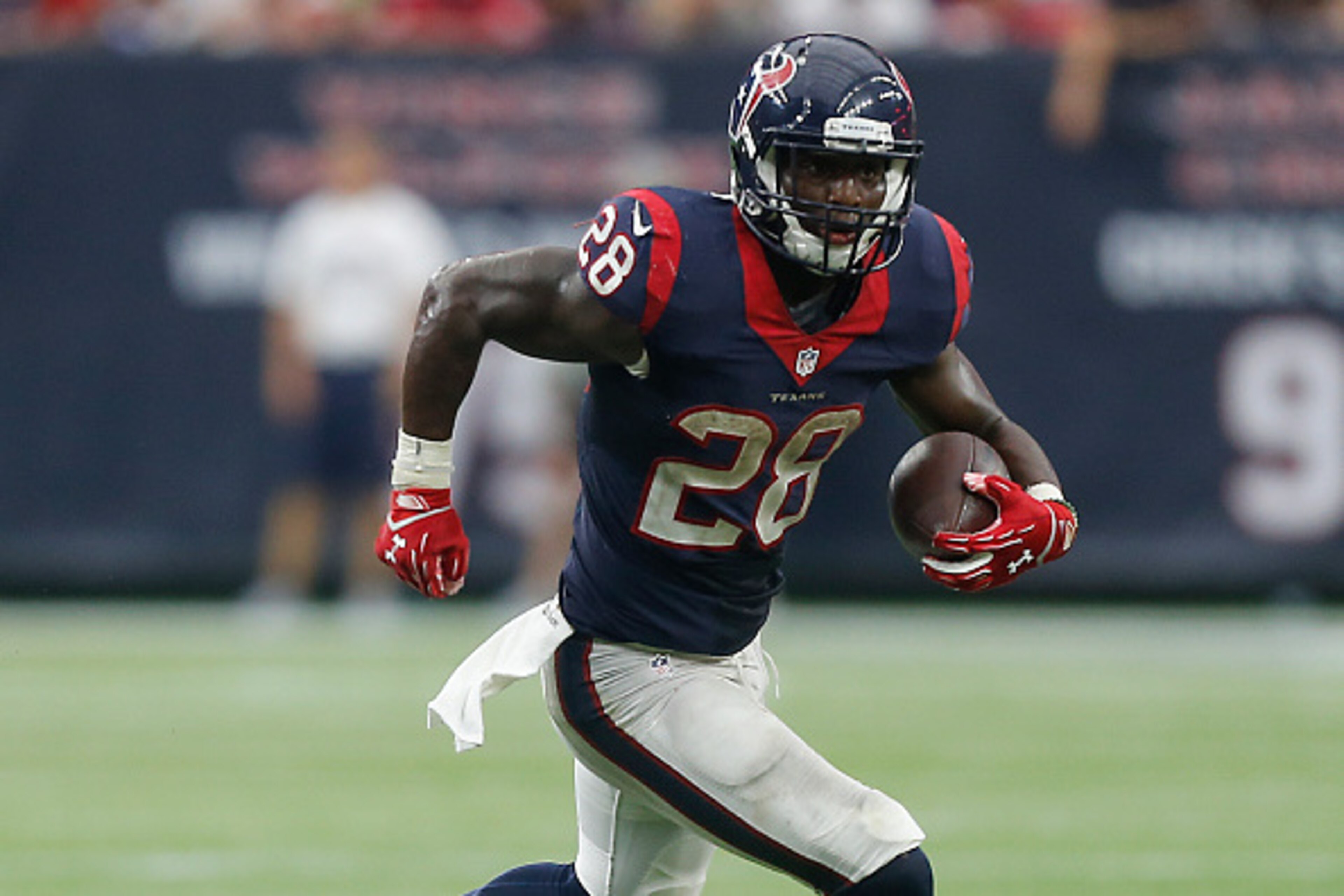 HOUSTON, TX - SEPTEMBER 27:  Alfred Blue #28 of the Houston Texans runs with the ball aTampa Bay Buccaneers at NRG Stadium on September 27, 2015 in Houston, Texas.  (Photo by Bob Levey/Getty Images)