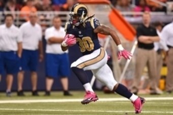 Oct 25, 2015; St. Louis, MO, USA; St. Louis Rams running back Todd Gurley (30) carries the ball against the Cleveland Browns during the second half at the Edward Jones Dome. Mandatory Credit: Jasen Vinlove-USA TODAY Sports