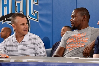 ORLANDO, FL - JULY 4: Billy Donovan and Kevin Durant #35 of the Oklahoma City Thunder sit on the sideline during a game against the Charlotte Hornets on July 4, 2015 at Amway Center in Orlando, Florida. NOTE TO USER: User expressly acknowledges and agrees