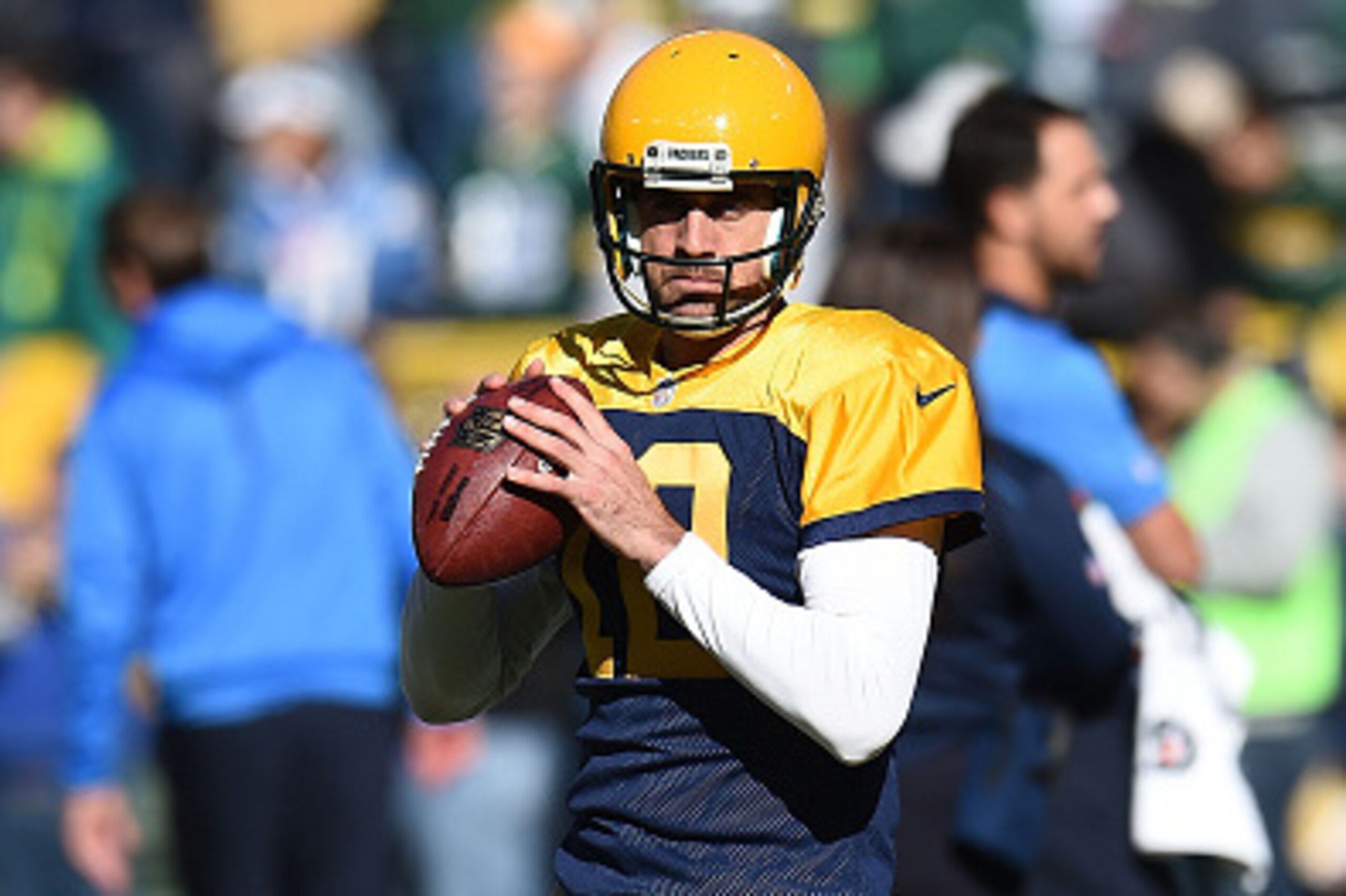 GREEN BAY, WI - OCTOBER 18:  Aaron Rodgers #12 of the Green Bay Packers participates in warmups prior to a game against the San Diego Chargers at Lambeau Field on October 18, 2015 in Green Bay, Wisconsin.  Green Bay defeated San Diego 27-20.  (Photo by St