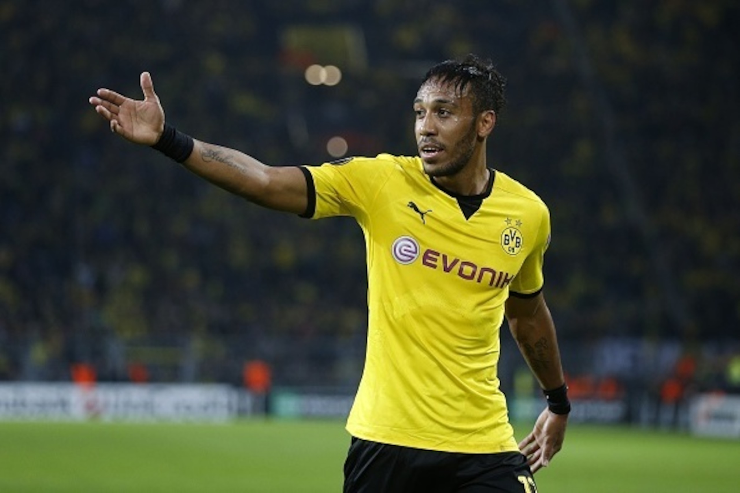 Dortmund's Gabonese striker Pierre-Emerick Aubameyang gestures during the UEFA Europa League Group C football match between Borussia Dortmund and FC Krasnodar in Dortmund, western Germany, on September 17, 2015.    AFP PHOTO / NORBERT SCHMIDT        (Phot