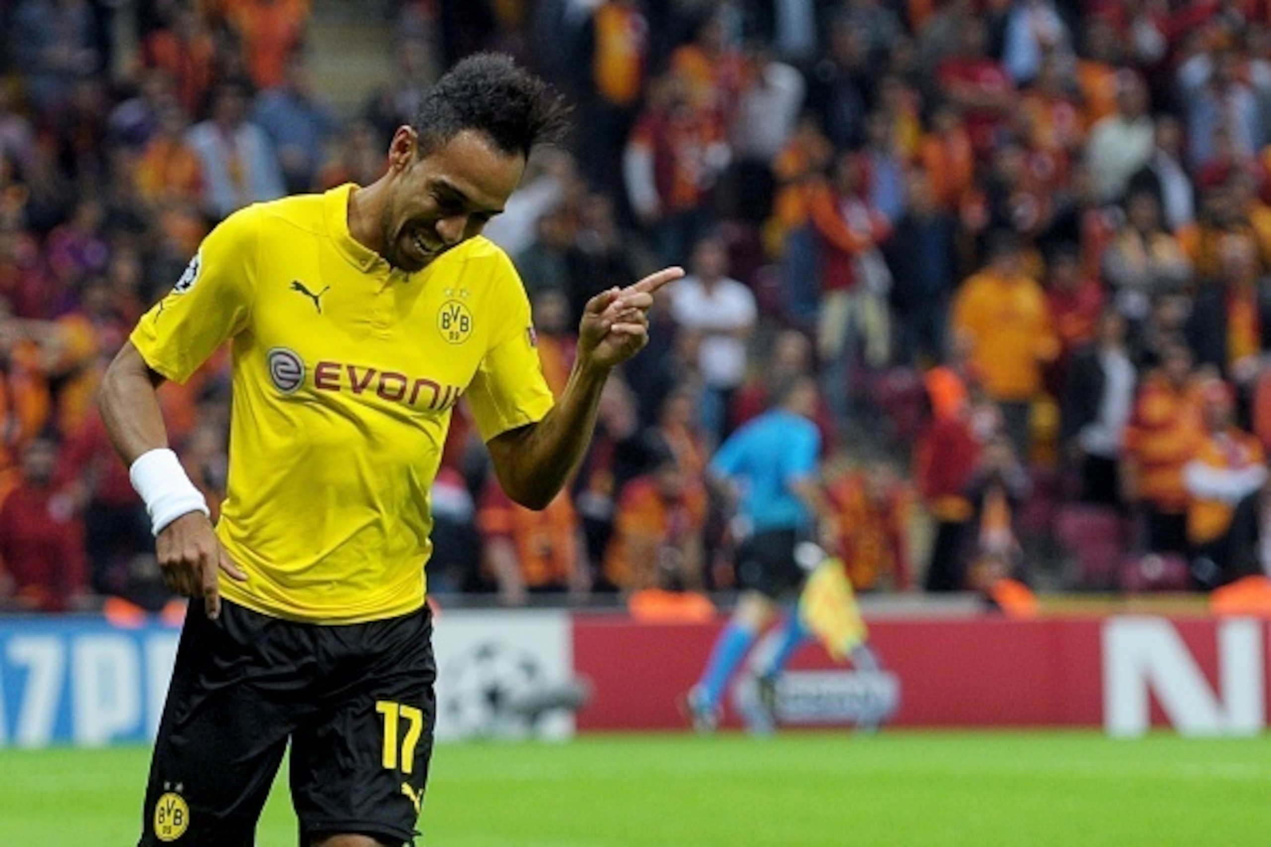 Dortmund's Gabonese forward Pierre-Emerick Aubameyang celebrates after scoring a goal during the UEFA Champions League Group D football match between Galatasaray and Borrusia Dortmund on October 22, 2014 at the Turk Telecom Arena in Istanbul. AFP PHOTO /O