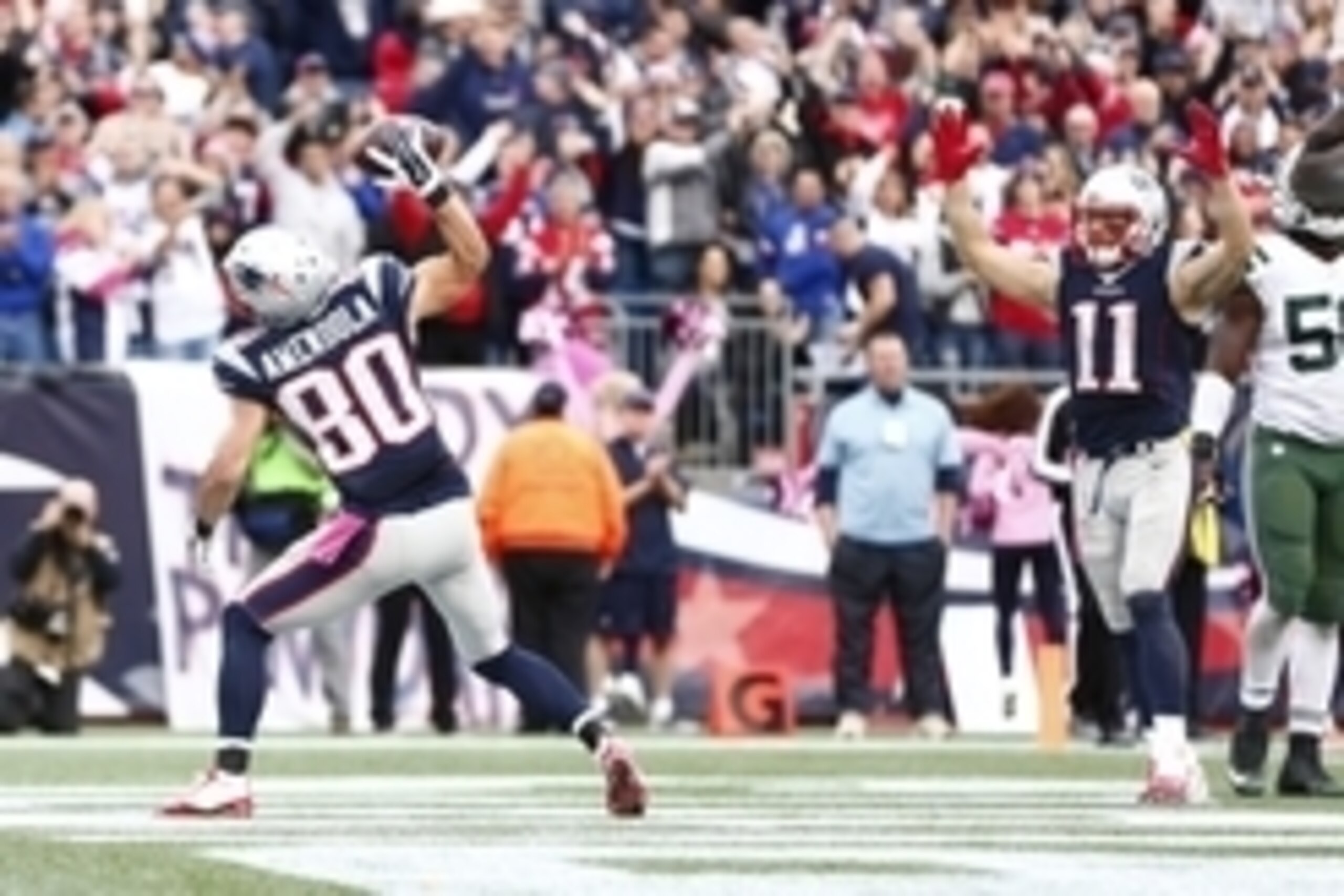 Oct 25, 2015; Foxborough, MA, USA; New England Patriots wide receiver Danny Amendola (80) celebrates his touchdown against the New York Jets with wide receiver Julian Edelman (11) during the second half at Gillette Stadium. Mandatory Credit: Mark L. Baer-