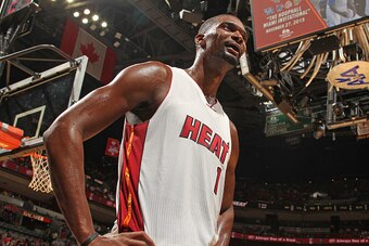 MIAMI, FL - OCTOBER 4:  Chris Bosh #1 of the Miami Heat looks on against the Charlotte Hornets during the preseason game on October 4, 2015 at AmericanAirlines Arena in Miami, Florida. NOTE TO USER: User expressly acknowledges and agrees that, by download