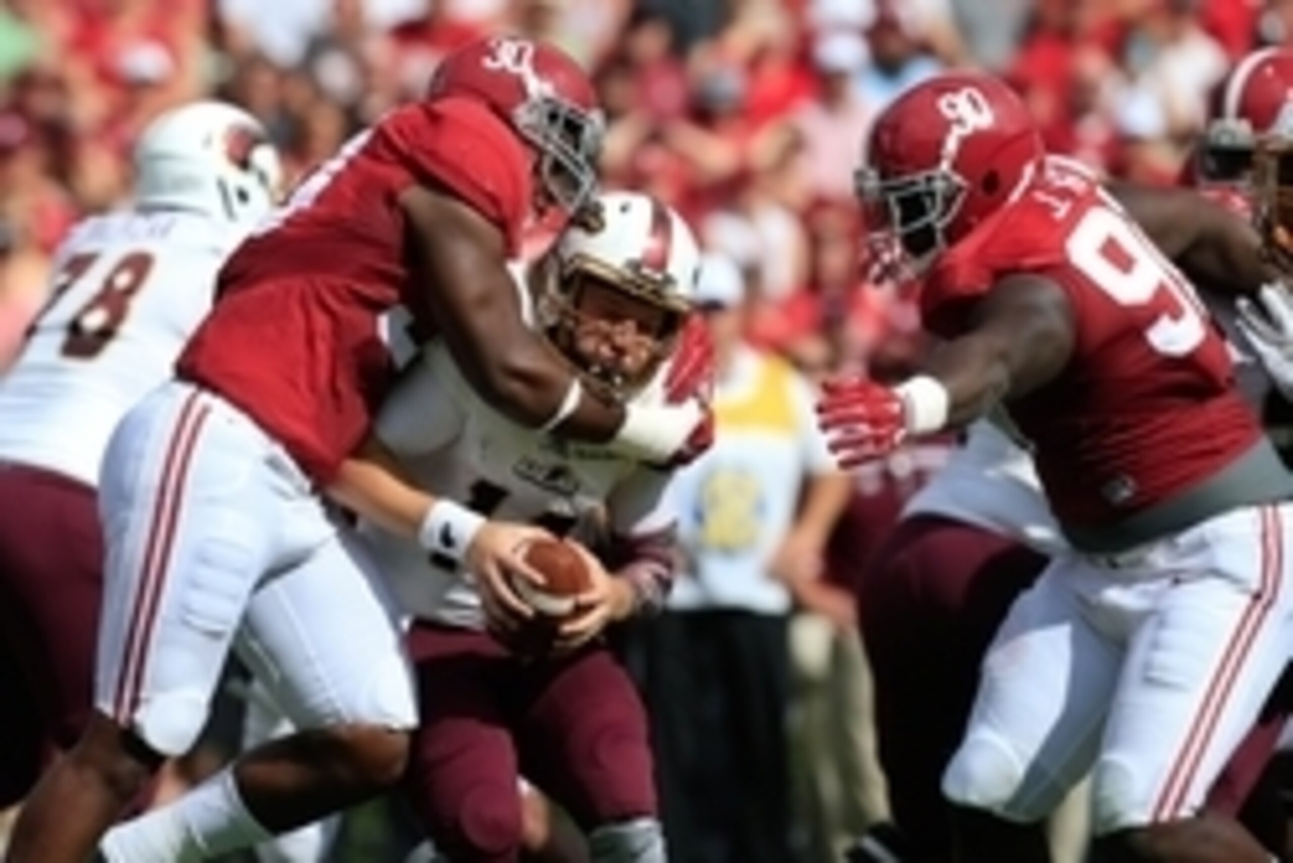 Sep 26, 2015; Tuscaloosa, AL, USA; Alabama Crimson Tide linebacker Denzel Devall (30) and defensive lineman Jarran Reed (90) tackle Louisiana Monroe Warhawks quarterback Garrett Smith (13) at Bryant-Denny Stadium. Mandatory Credit: Marvin Gentry-USA TODAY