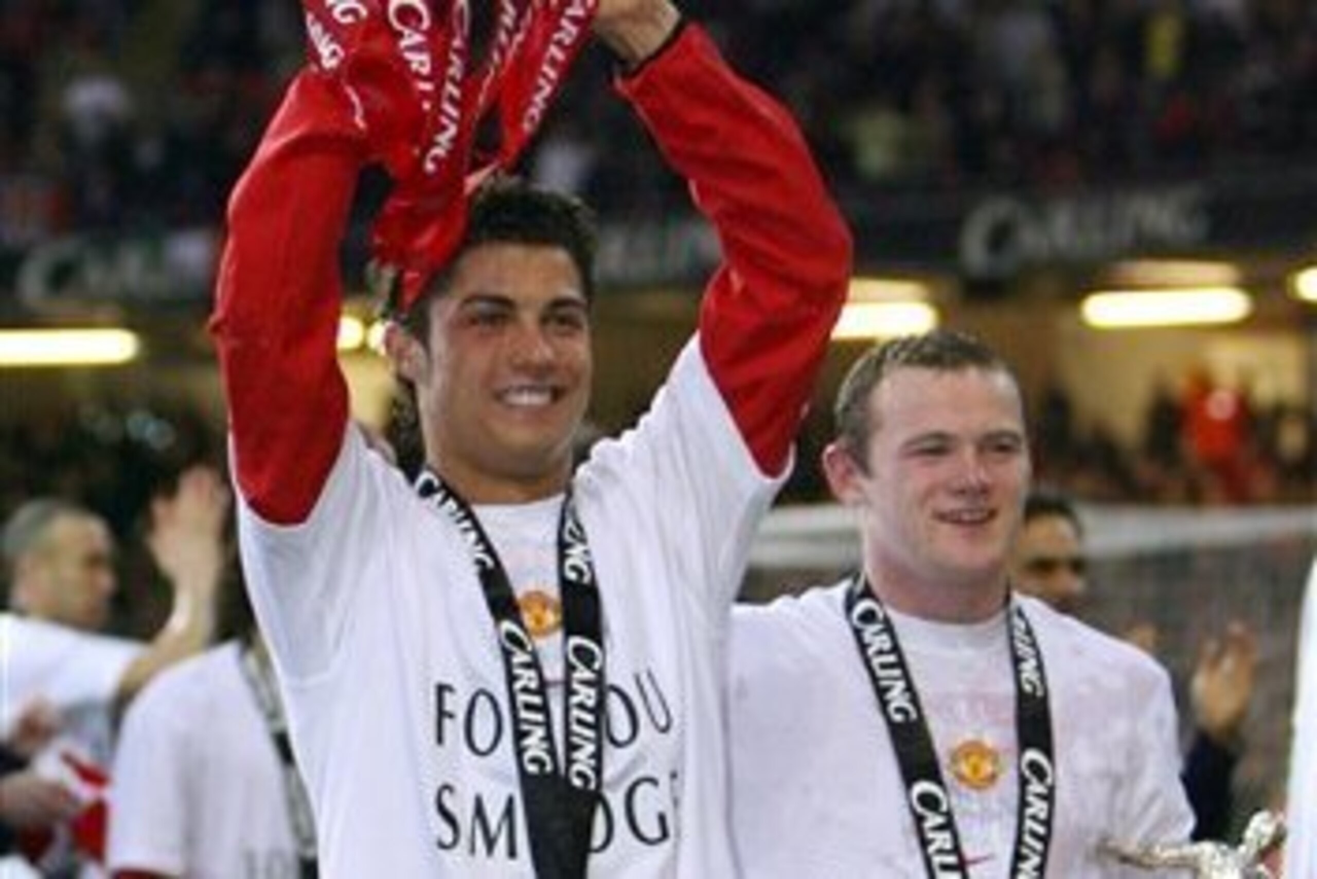 Rooney and Ronaldo celebrate the League Cup win in 2006 Rooney and Ronaldo celebrate the League Cup win in 2006