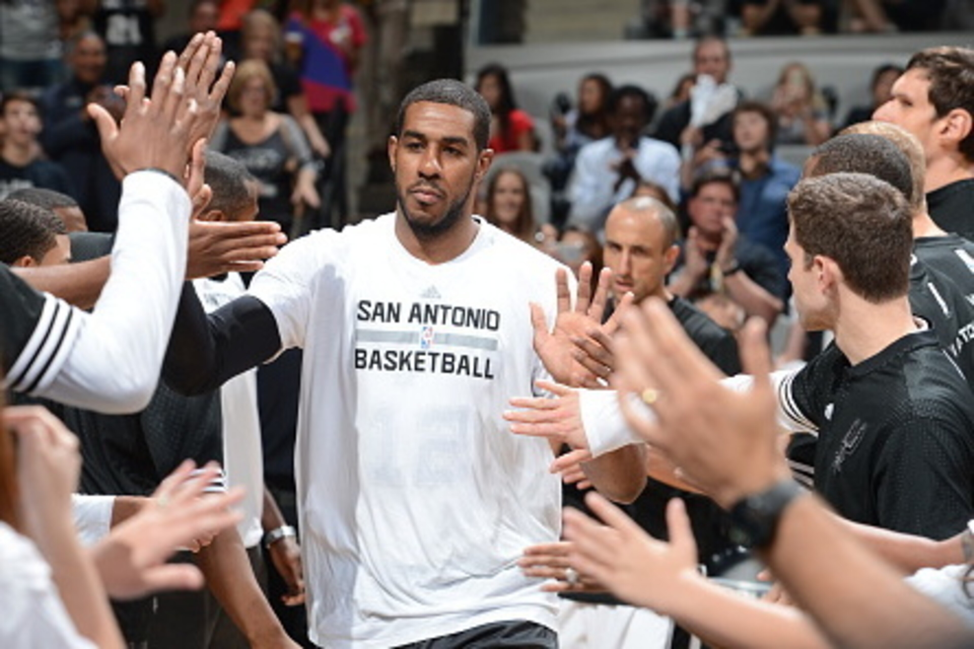 SAN ANTONIO, TX - OCTOBER 18: LaMarcus Aldridge #12 of the San Antonio Spurs is introduced before a preseason game against the Detroit Pistons on October 18, 2015 at the AT&T Center in San Antonio, Texas. NOTE TO USER: User expressly acknowledges and agr SAN ANTONIO, TX - OCTOBER 18: LaMarcus Aldridge #12 of the San Antonio Spurs is introduced before a preseason game against the Detroit Pistons on October 18, 2015 at the AT&T Center in San Antonio, Texas. NOTE TO USER: User expressly acknowledges and agr
