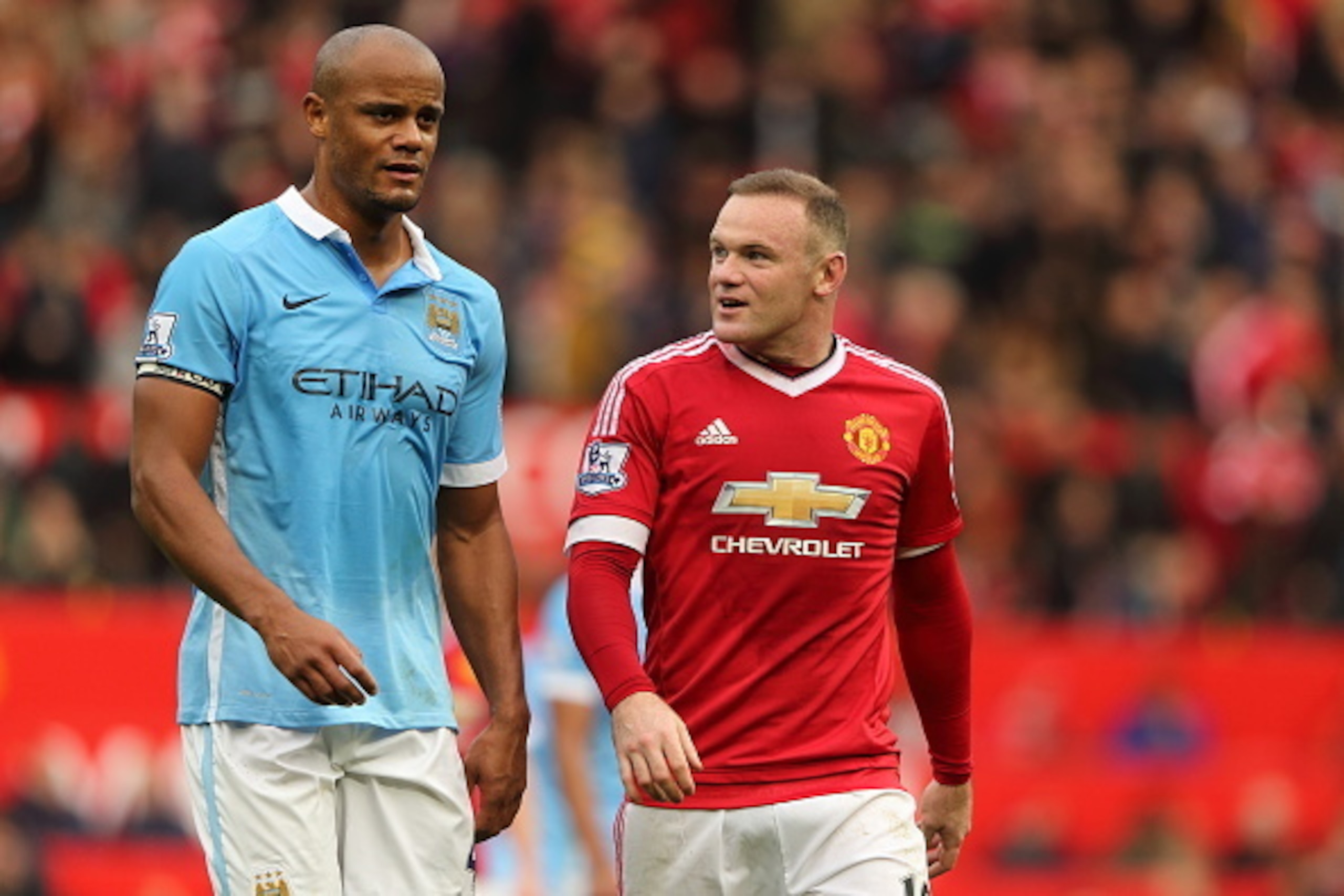 MANCHESTER, ENGLAND - OCTOBER 25: Vincent Kompany of Manchester City and Wayne Rooney of Manchester United walk off at half time during the Barclays Premier League match between Manchester United and Manchester City at Old Trafford on October 25, 2015 in MANCHESTER, ENGLAND - OCTOBER 25: Vincent Kompany of Manchester City and Wayne Rooney of Manchester United walk off at half time during the Barclays Premier League match between Manchester United and Manchester City at Old Trafford on October 25, 2015 in