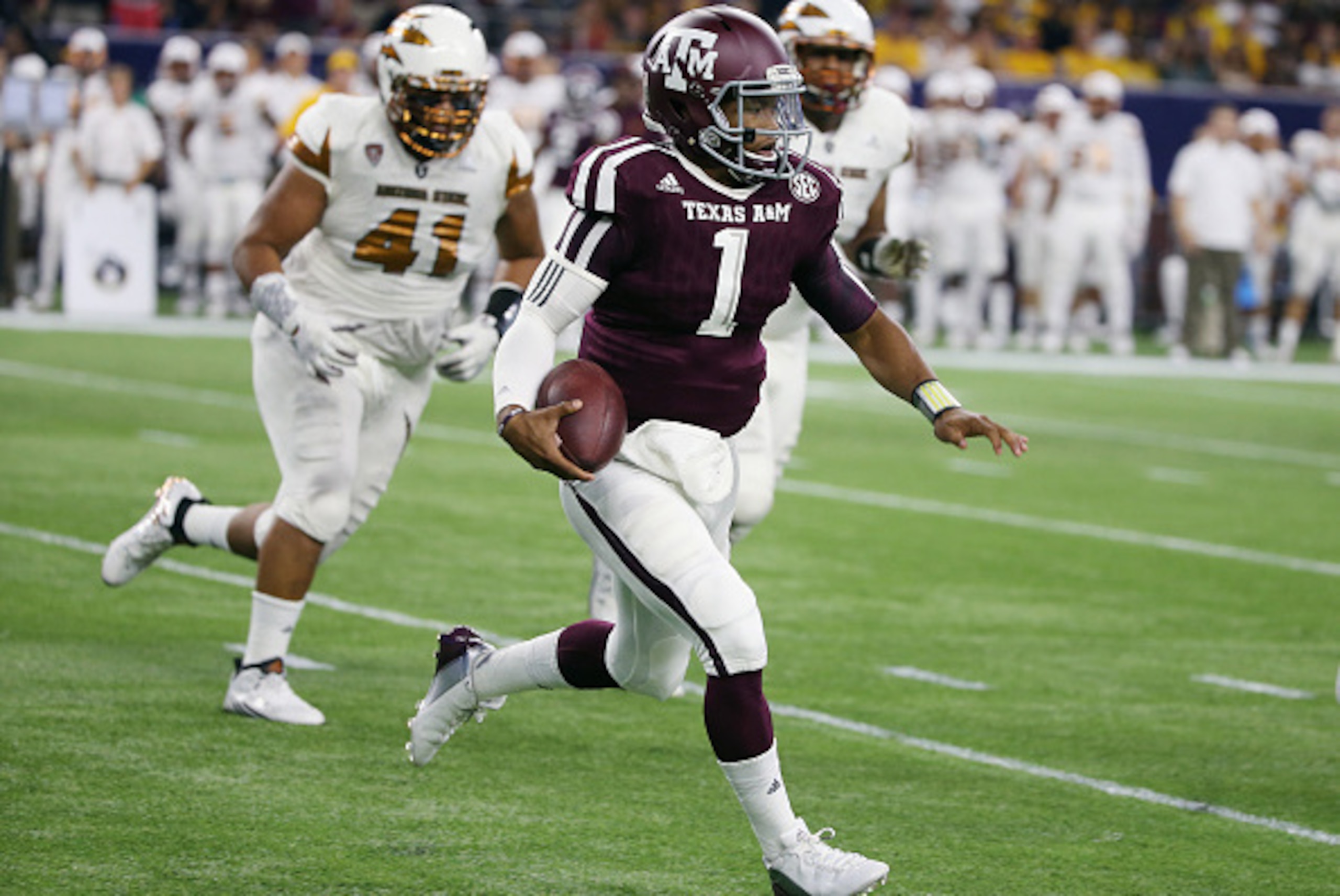 HOUSTON, TX - SEPTEMBER 05:  Kyler Murray #1 of the Texas A&M Aggies runs upfield in the first half of their game against the Arizona State Sun Devils during the Advocare Texas Kickoff at NRG Stadium on September 5, 2015 in Houston, Texas.  (Photo by Scot