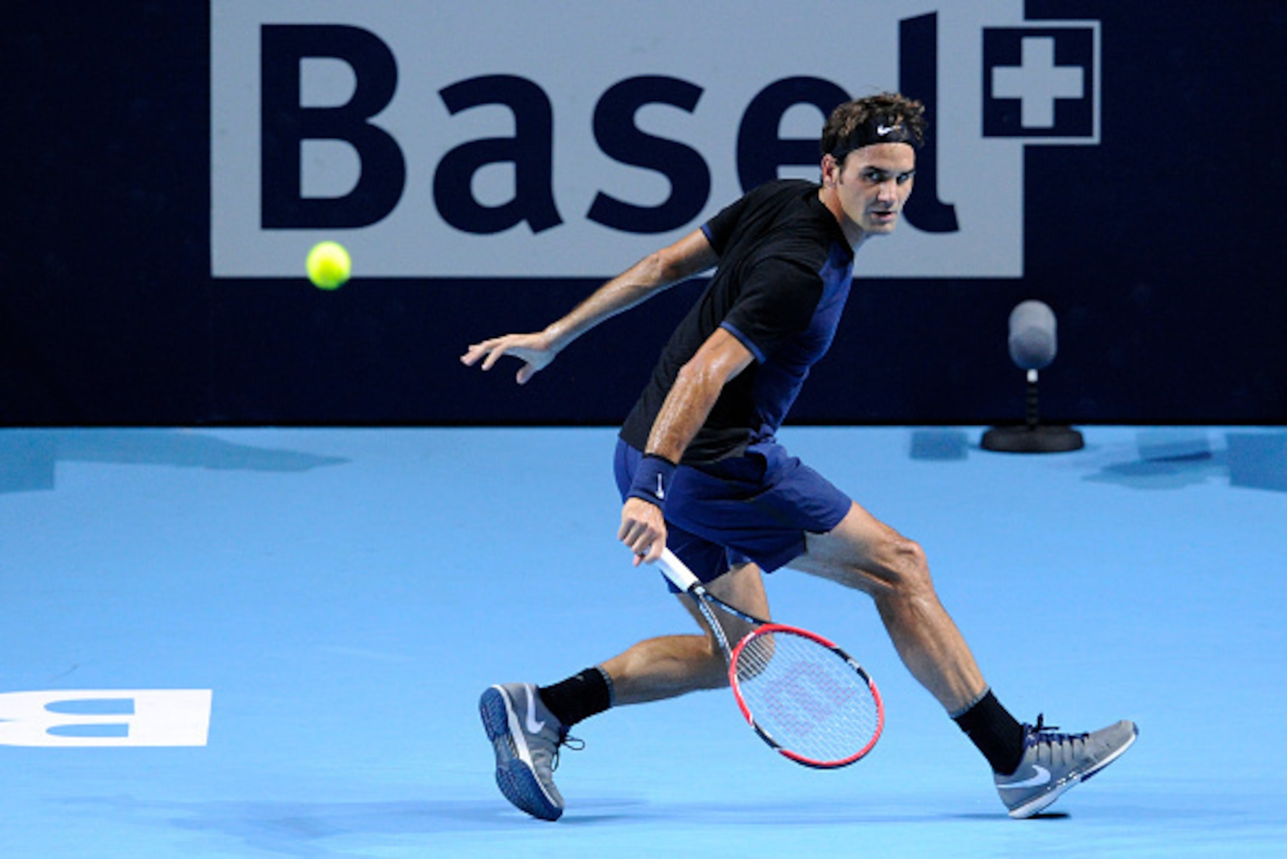 BASEL, SWITZERLAND - OCTOBER 27: Roger Federer of Switzerland in action during the second day of the Swiss Indoors ATP 500 tennis tournament match against Mikhail Kukushkin of Kazakhstan at St Jakobshalle on October 27, 2015 in Basel, Switzerland. (Phot BASEL, SWITZERLAND - OCTOBER 27: Roger Federer of Switzerland in action during the second day of the Swiss Indoors ATP 500 tennis tournament match against Mikhail Kukushkin of Kazakhstan at St Jakobshalle on October 27, 2015 in Basel, Switzerland. (Phot