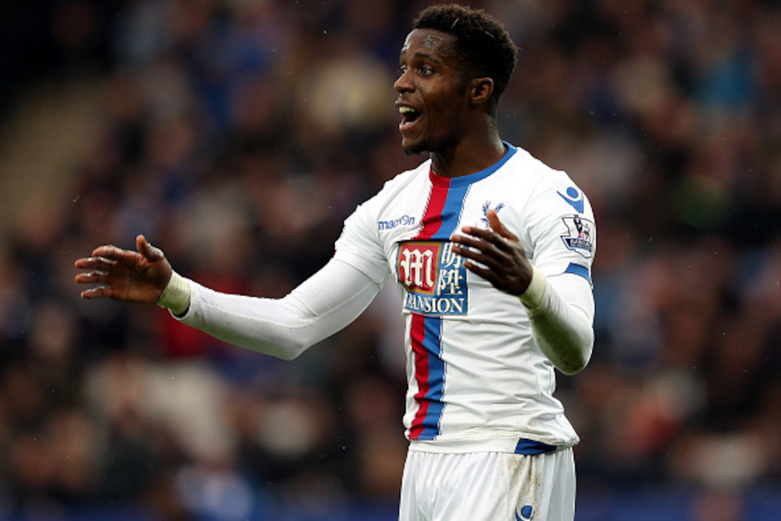 LEICESTER, ENGLAND - OCTOBER 24: Wilfried Zaha of Crystal Palace during the Barclays Premier League match between Leicester City and Crystal Palace at The King Power Stadium on October 24, 2015 in Leicester, England. (Photo by Nigel Roddis/Getty Images) LEICESTER, ENGLAND - OCTOBER 24: Wilfried Zaha of Crystal Palace during the Barclays Premier League match between Leicester City and Crystal Palace at The King Power Stadium on October 24, 2015 in Leicester, England. (Photo by Nigel Roddis/Getty Images)