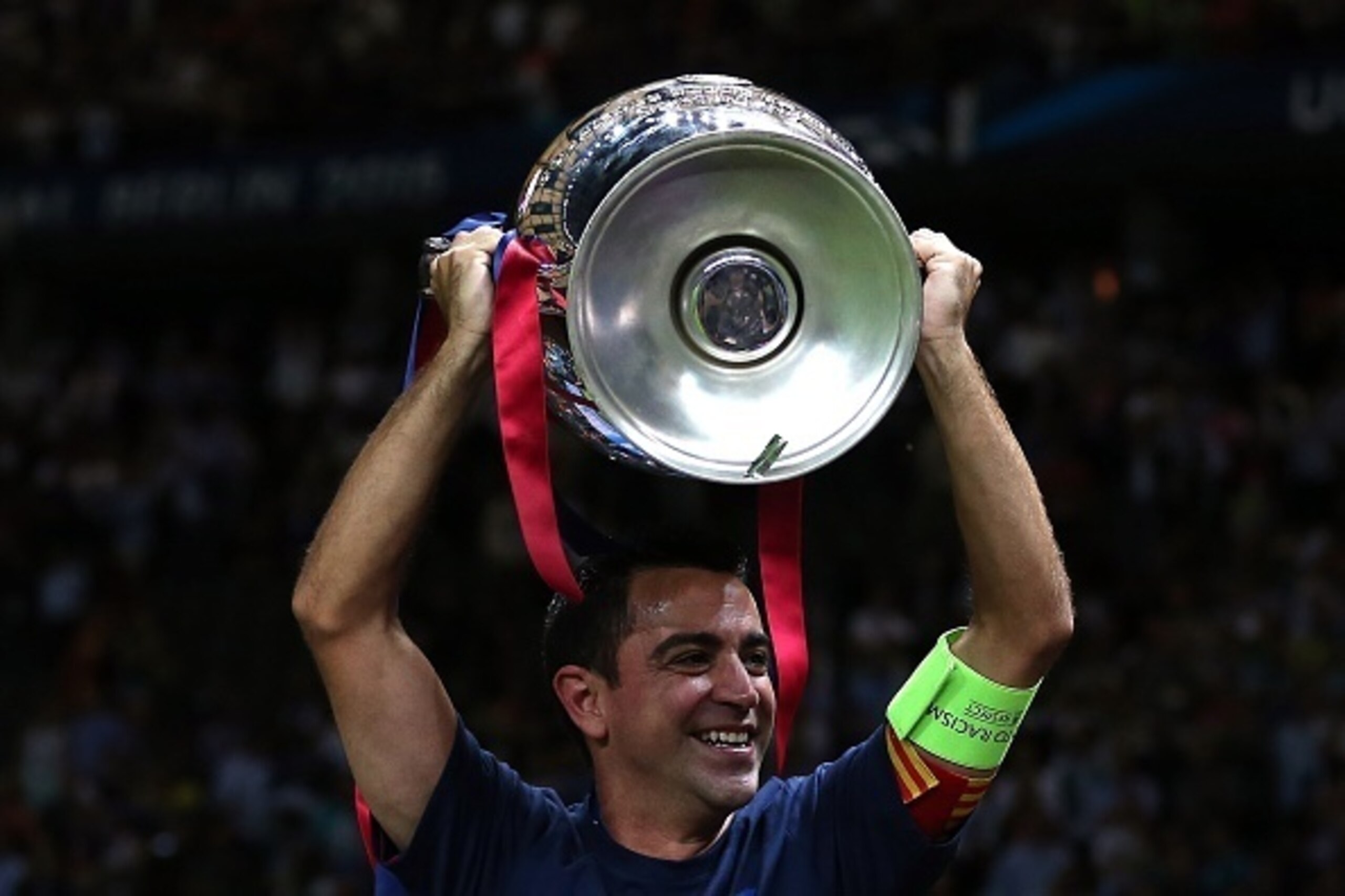 BERLIN, GERMANY - JUNE 6: Xavi of FC Barcelona lifts the trophy following the UEFA Champions League Final match between Juventus and FC Barcelona at the Olympiastadion on June 6, 2015 in Berlin, Germany. (Photo by Chris Brunskill Ltd/Getty Images)
