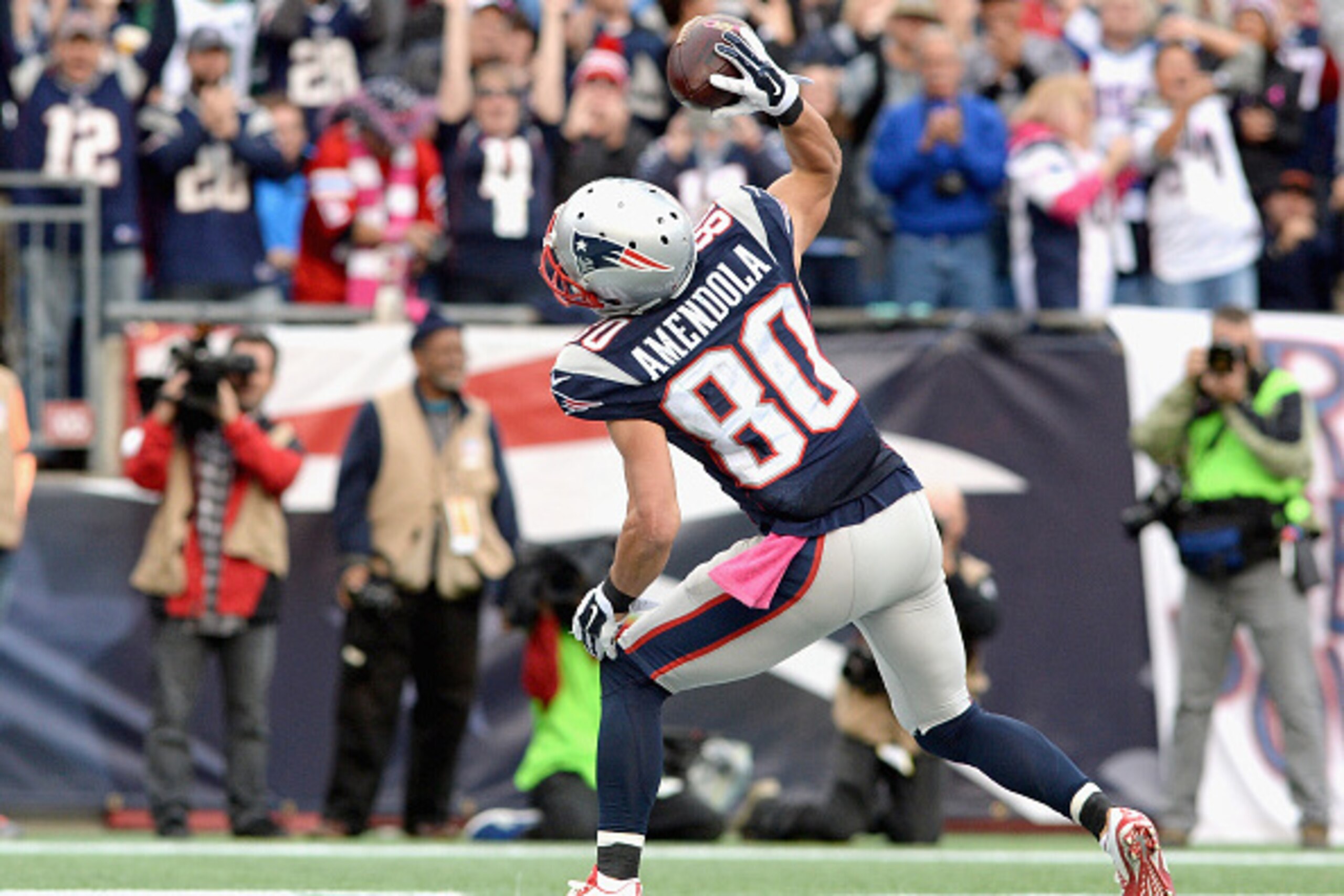 FOXBORO, MA - OCTOBER 25:  Danny Amendola #80 of the New England Patriots reacts after scoring a touchdown during the fourth quarter against the New York Jets at Gillette Stadium on October 25, 2015 in Foxboro, Massachusetts.  (Photo by Darren McCollester