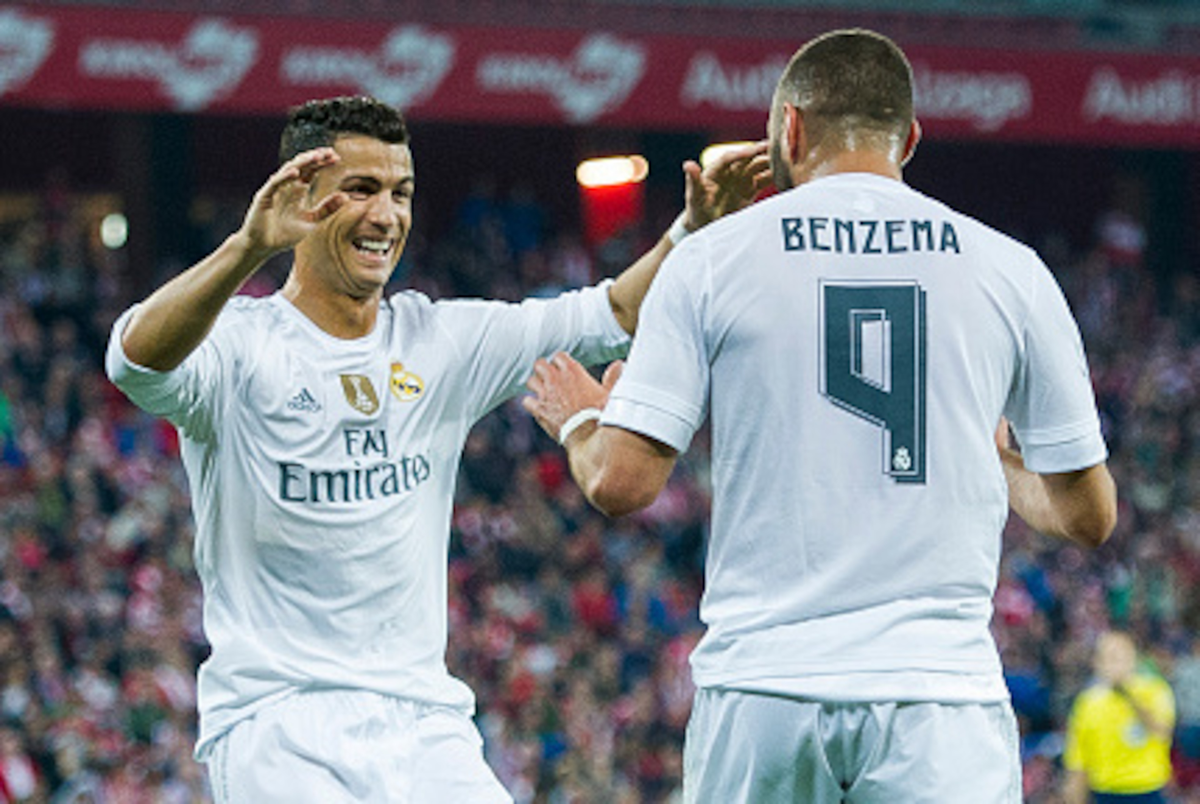 BILBAO, SPAIN - SEPTEMBER 23:  Karim Benzema of Real Madrid CF celebrates after scoring with teammate Cristiano Ronaldo during the La Liga match between Athletic Club Bilbao and Real Madrid CF at San Mames Stadium on September 23, 2015 in Bilbao, Spain.  