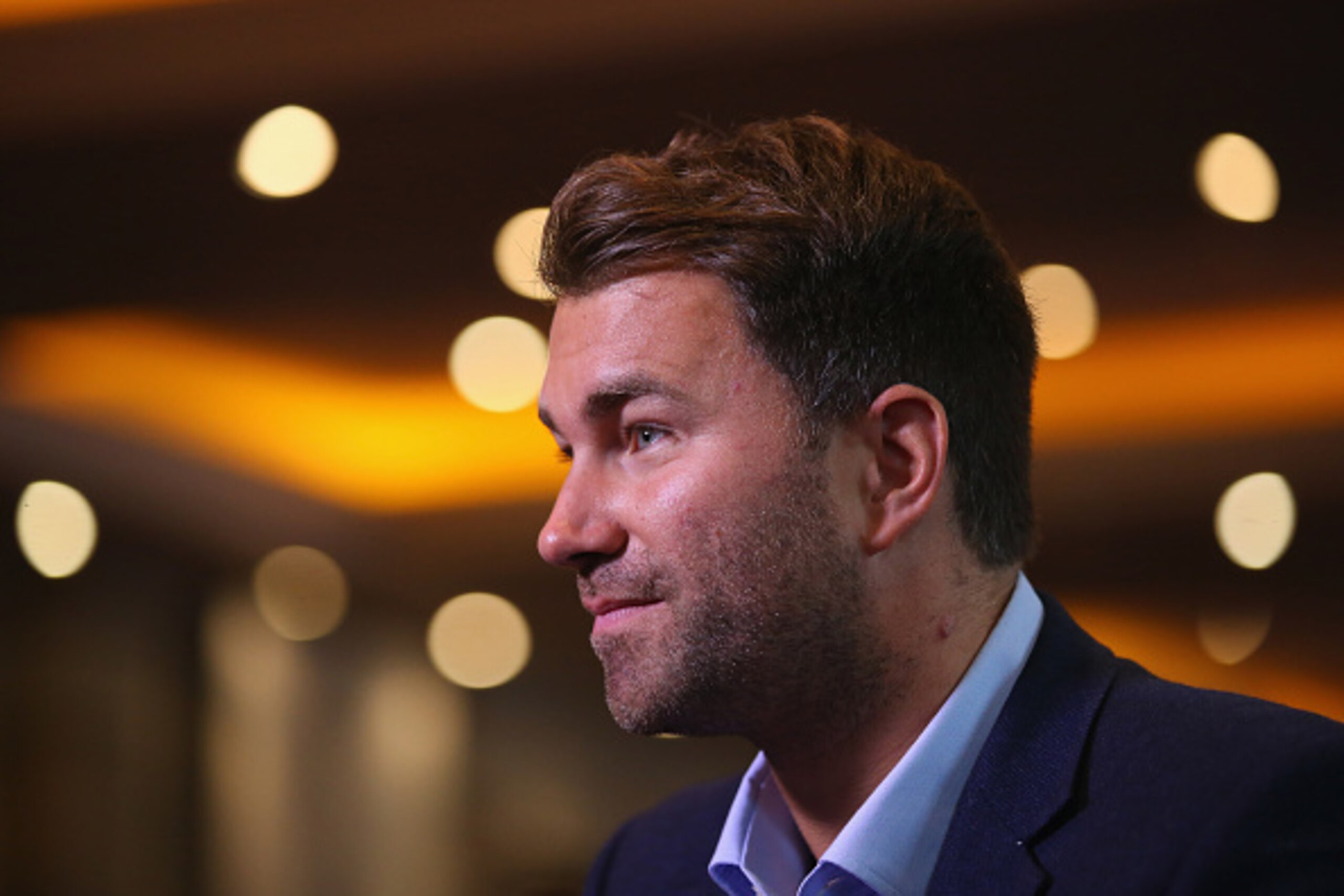 MANCHESTER, ENGLAND - SEPTEMBER 21:  Promoter Eddie Hearn is interviewed during a press conference to promote the forthcoming rematch between Anthony Crolla and Darleys Perez II at the Radisson Blu Hotel on September 21, 2015 in Manchester, England.  (Pho
