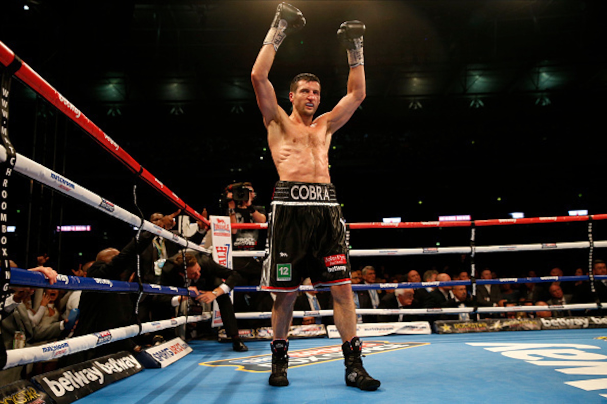 Froch celebrates victory during the Carl Froch v George Groves World Super-middleweight fight at Wembley Stadium on May 31st 2014 in London (Photo by Tom Jenkins/Getty Images)