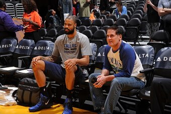 LOS ANGELES, CA - MARCH 08: Tyson Chandler #6 and owner Mark Cuban of the Dallas Mavericks speak before a game against the Los Angeles Lakers at STAPLES Center on March 8, 2015 in Los Angeles, California. NOTE TO USER: User expressly acknowledges and agre
