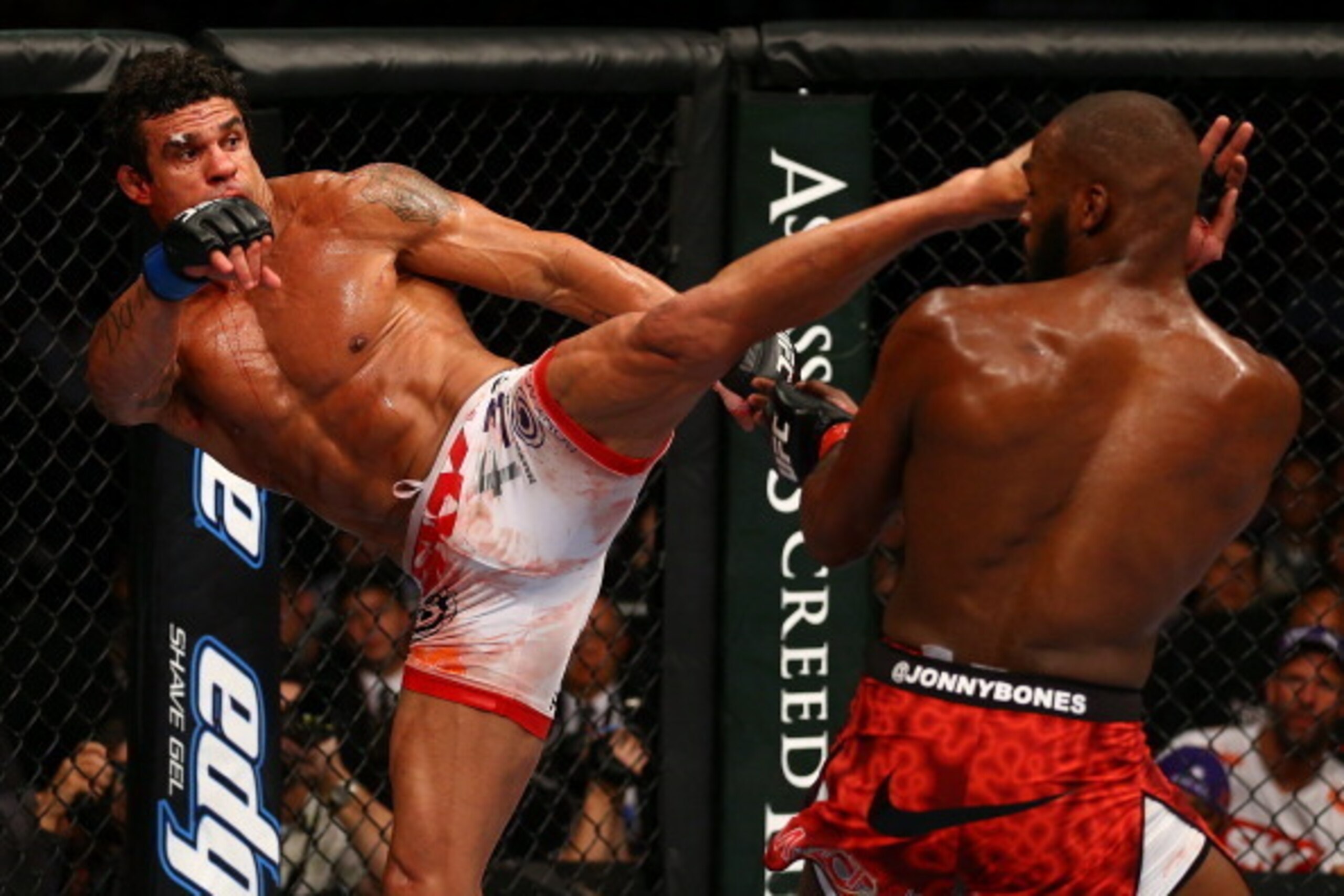 TORONTO, CANADA - SEPTEMBER 22: (L-R) Vitor Belfort kicks Jon ''Bones'' Jones during their light heavyweight championship bout at UFC 152 inside Air Canada Centre on September 22, 2012 in Toronto, Ontario, Canada. (Photo by Al Bello/Zuffa LLC/Zuffa LLC vi