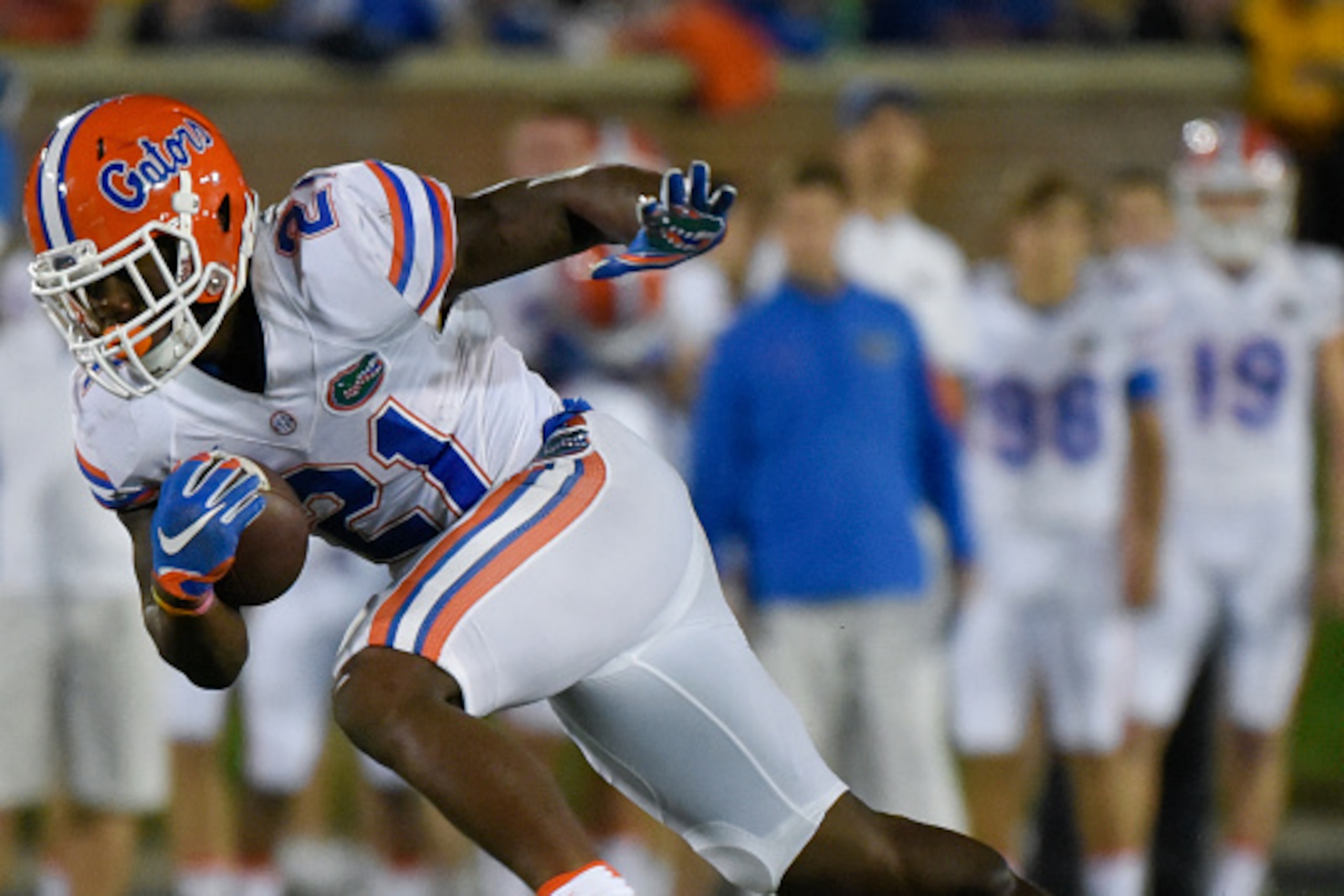 COLUMBIA, MO - OCTOBER 10:  Running back Kelvin Taylor #21 of the Florida Gators rushes against the Missouri Tigers in the first quarter at Memorial Stadium on October 10, 2015 in Columbia, Missouri.  (Photo by Ed Zurga/Getty Images)