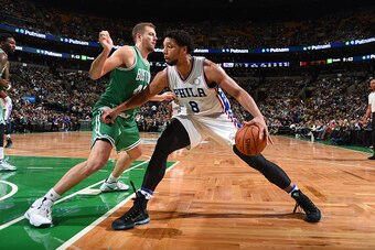 BOSTON, MA - OCTOBER 28:  Jahlil Okafor #8 of the Philadelphia 76ers handles the ball against David Lee #42 of the Boston Celtics on October 28, 2015 at the TD Garden in Boston, Masachusetts. NOTE TO USER: User expressly acknowledges and agrees that, by d