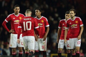 MANCHESTER, UNITED KINGDOM - OCTOBER 28:  Manchester United players react after Wayne Rooney missed his penalty during the penalty shoot out in the Capital One Cup Fourth Round match between Manchester United v Middlesbrough at Old Trafford on October 28,