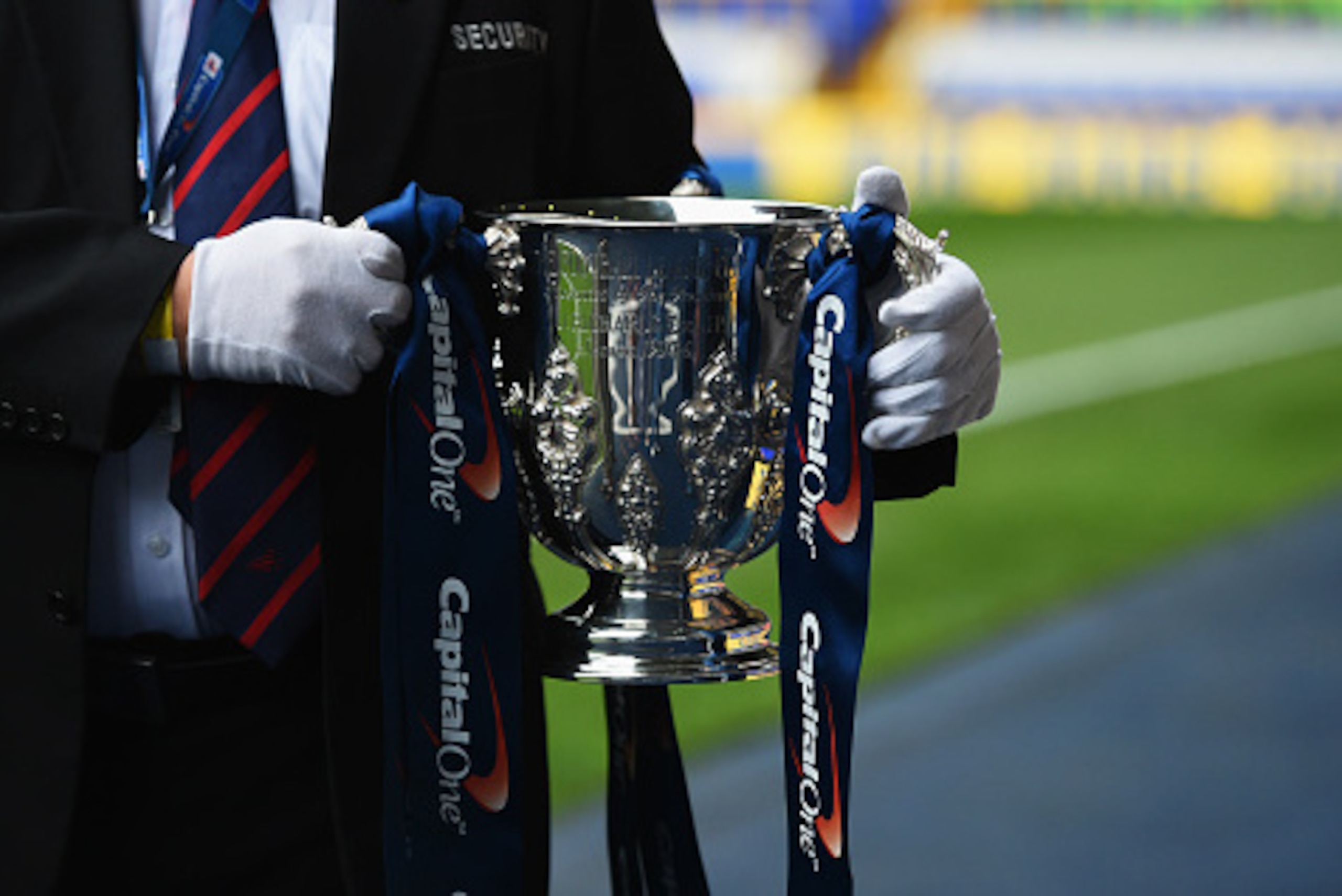 LONDON, ENGLAND - SEPTEMBER 23:  The League Cup trophy is carried prior to the Capital One Cup third round match between Tottenham Hotspur and Arsenal at White Hart Lane on September 23, 2015 in London, England.  (Photo by Tom Dulat/Getty Images)
