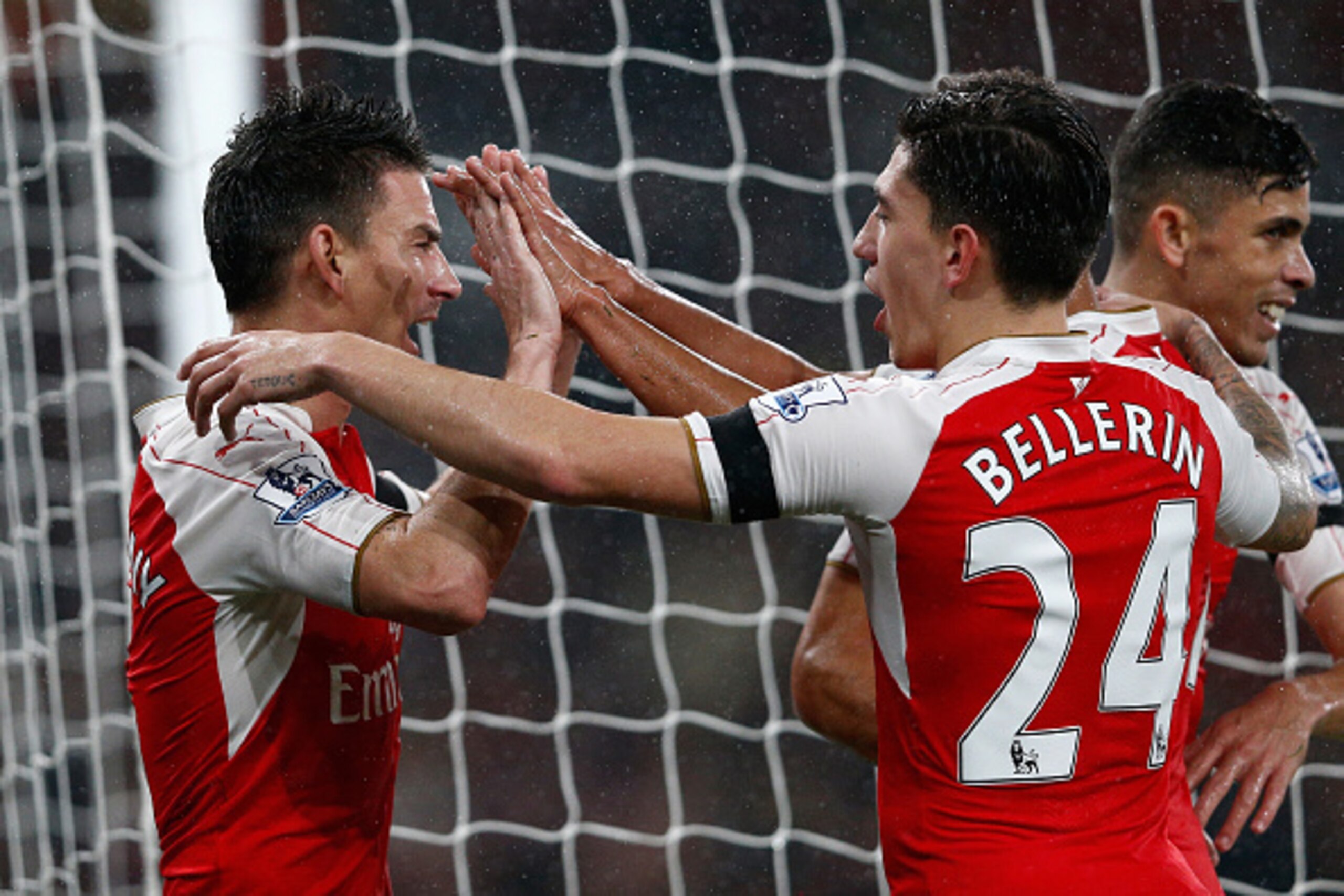 LONDON, ENGLAND - OCTOBER 24:  Laurent Koscielny (L) of Arsenal celebrates scoring his team's second goal with his team mate Hector Bellerin (R) during the Barclays Premier League match between Arsenal and Everton at Emirates Stadium on October 24, 2015 i