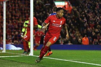 LIVERPOOL, ENGLAND - OCTOBER 28: Nathaniel Clyne of Liverpool turns away after scoring the opening goal during the Capital One Cup Fourth Round match between Liverpool and AFC Bournemouth at Anfield on October 28, 2015 in Liverpool, England.  (Photo by Ch