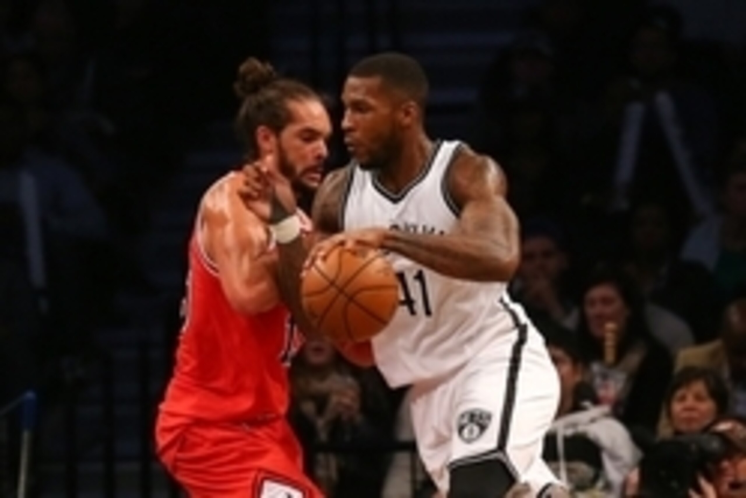 Oct 28, 2015; Brooklyn, NY, USA;  Brooklyn Nets forward Thomas Robinson (41) drives against Chicago Bulls center Joakim Noah (13) during the fourth quarter at Barclays Center. Chicago won 115-100. Mandatory Credit: Anthony Gruppuso-USA TODAY Sports
